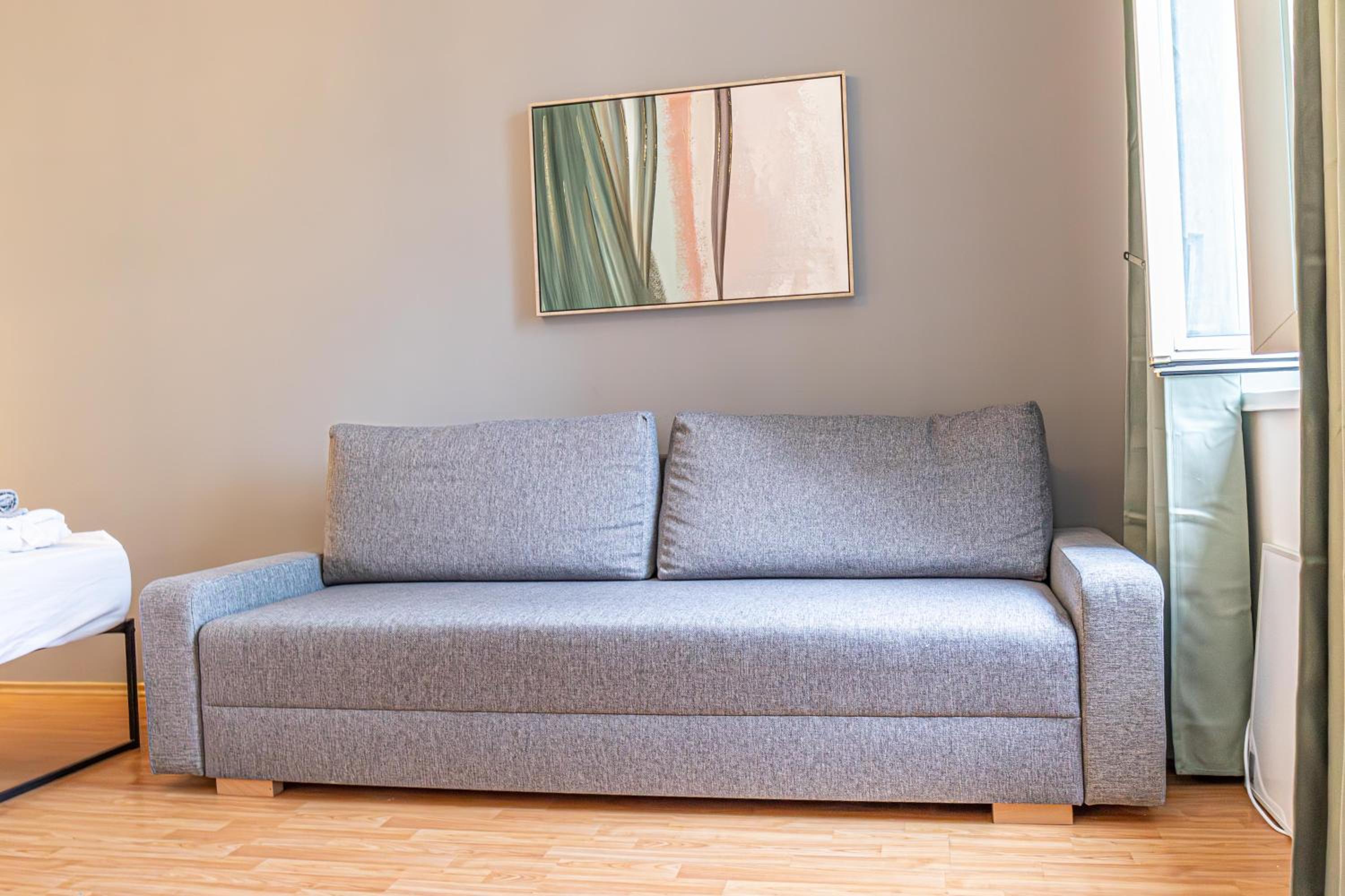 Enjoy The Danube and Prater Stern from Our 1BR Gem