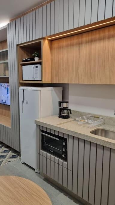 Apartamento ensolarado em condomínio clube