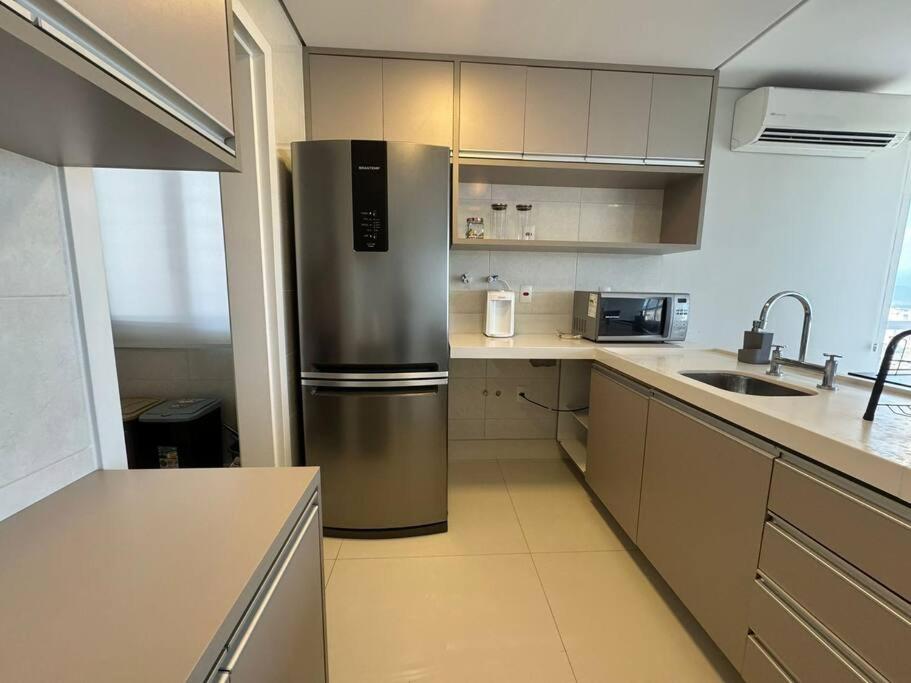 Apartamento 01 quadra da praia - LUXO Praiamar Residence