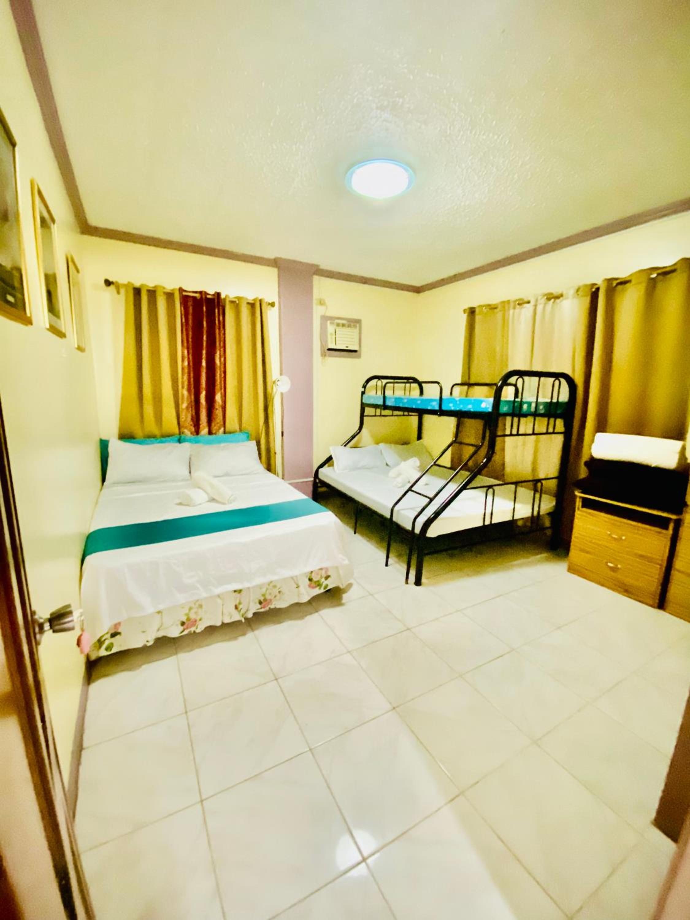 Len Staycation in Panabo 3BDR-2BR-Downstairs Wifi Netflix