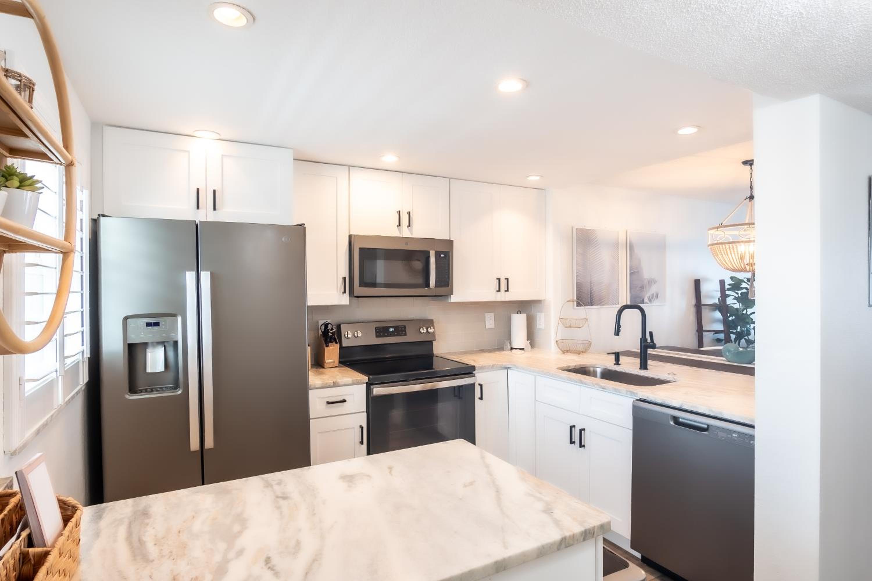 Stunning coastal condo with ocean and pool views from the balcony!