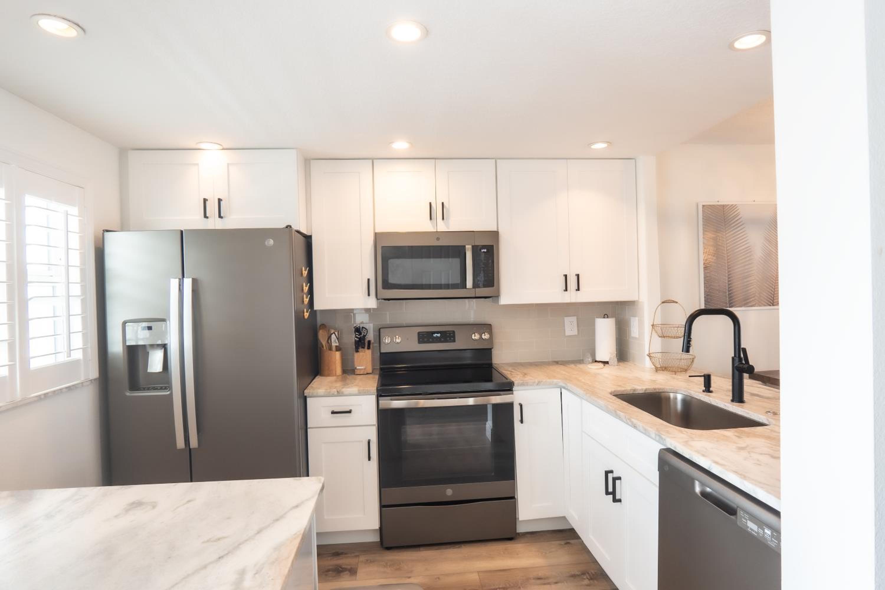Stunning coastal condo with ocean and pool views from the balcony!