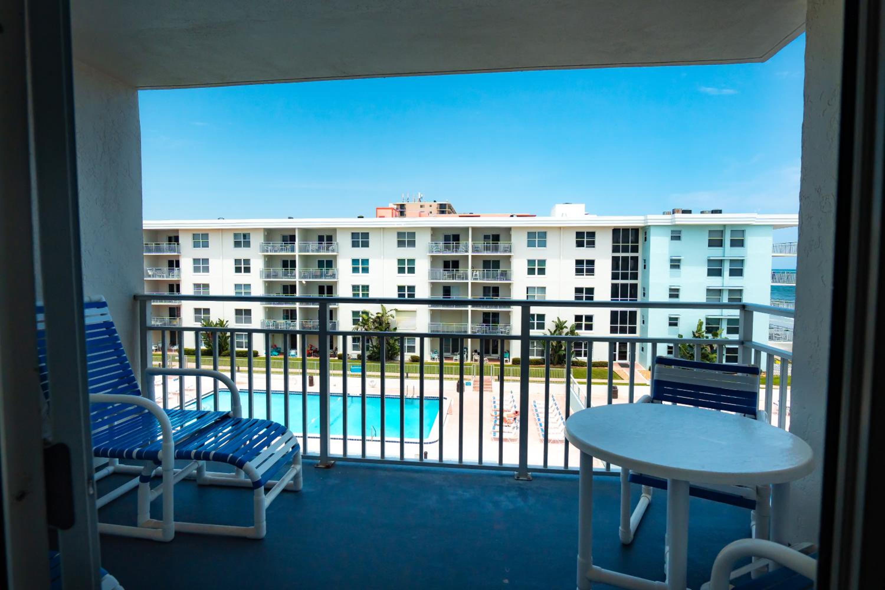 Stunning coastal condo with ocean and pool views from the balcony!