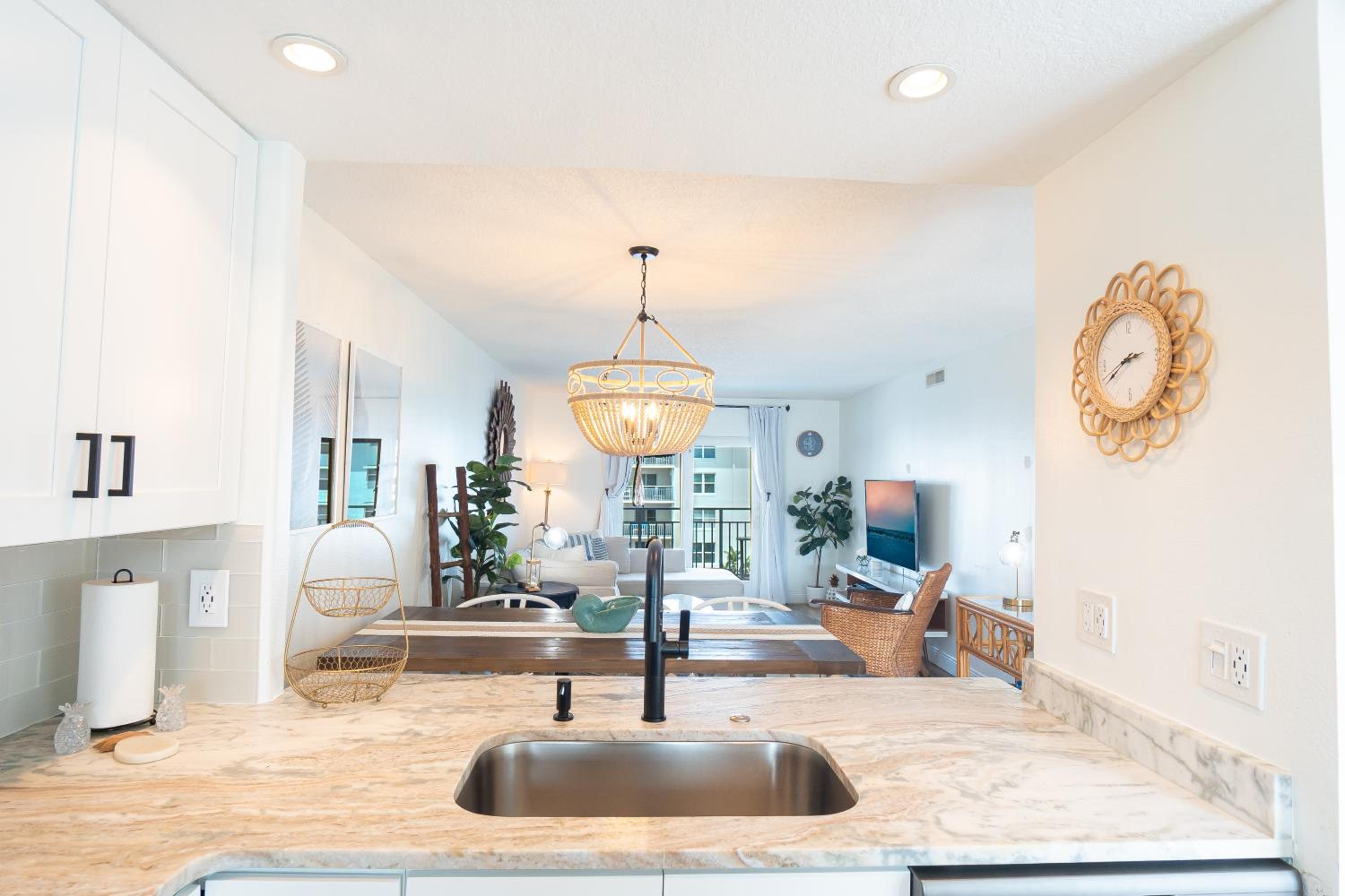 Stunning coastal condo with ocean and pool views from the balcony!