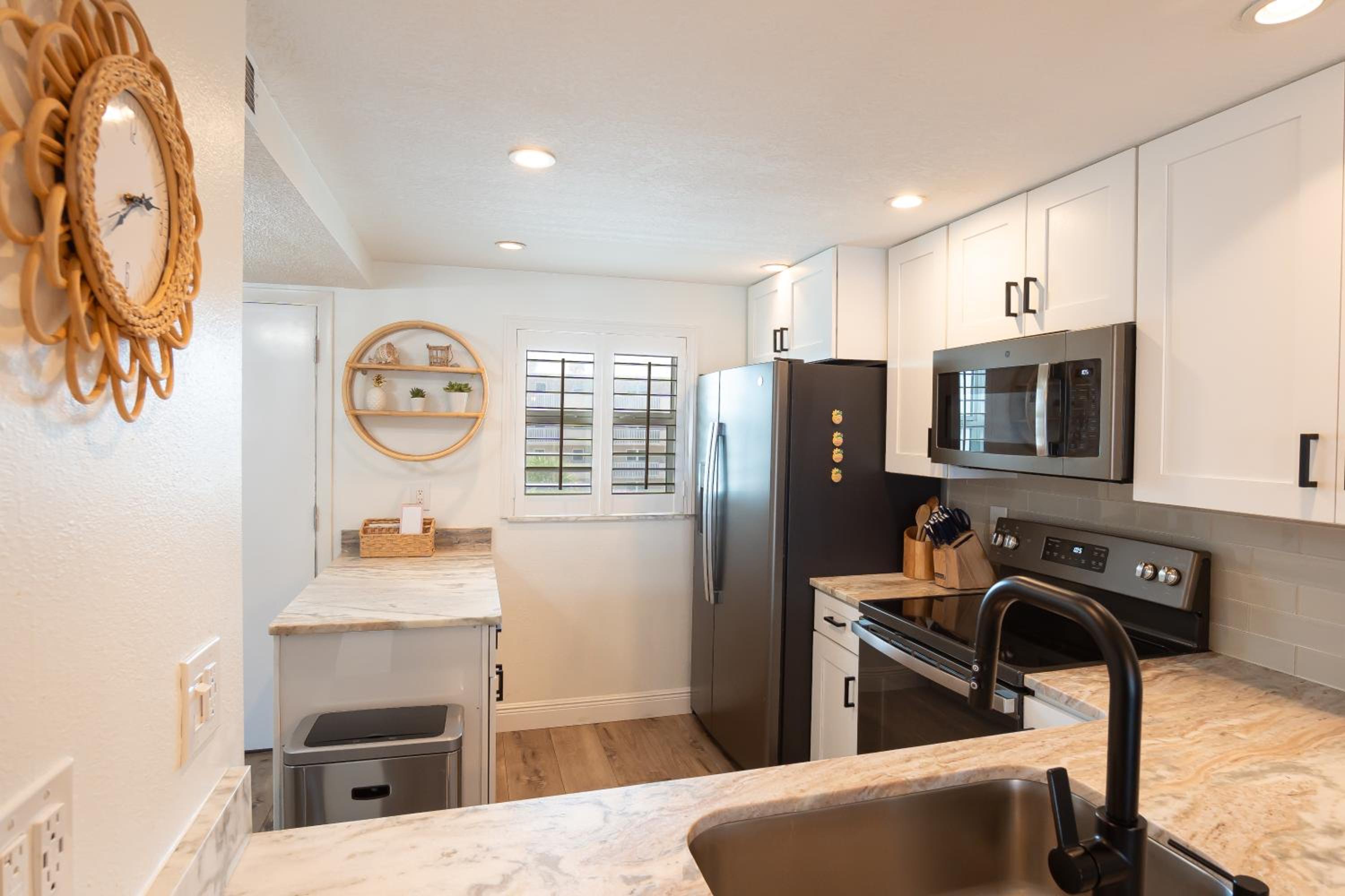 Stunning coastal condo with ocean and pool views from the balcony!