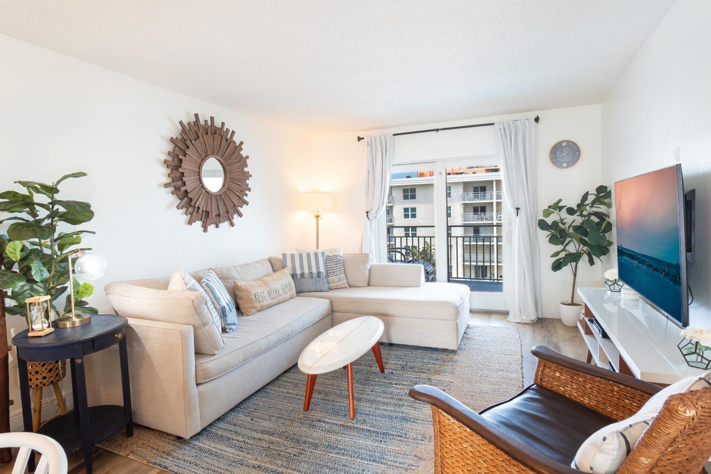 Stunning coastal condo with ocean and pool views from the balcony!