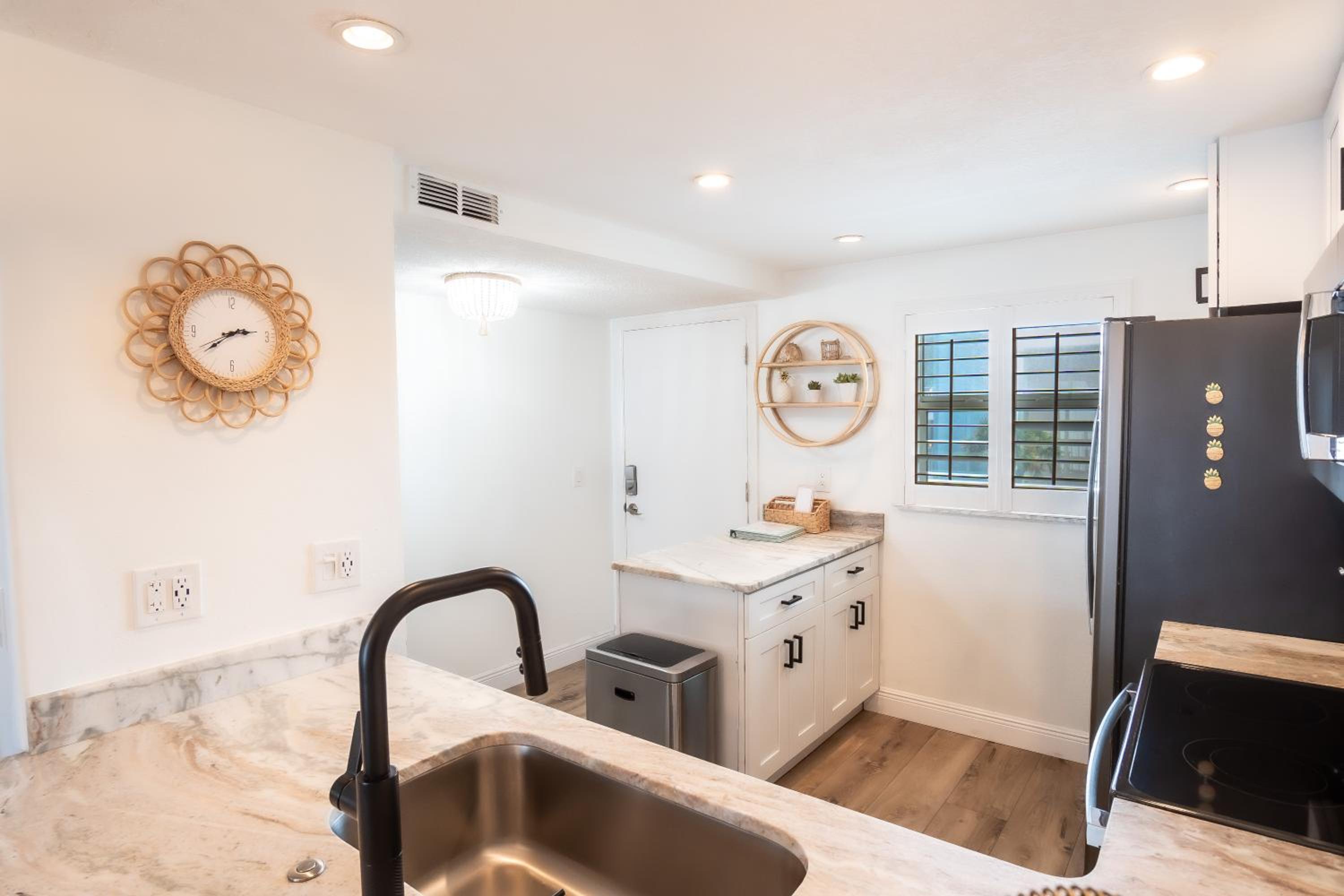 Stunning coastal condo with ocean and pool views from the balcony!