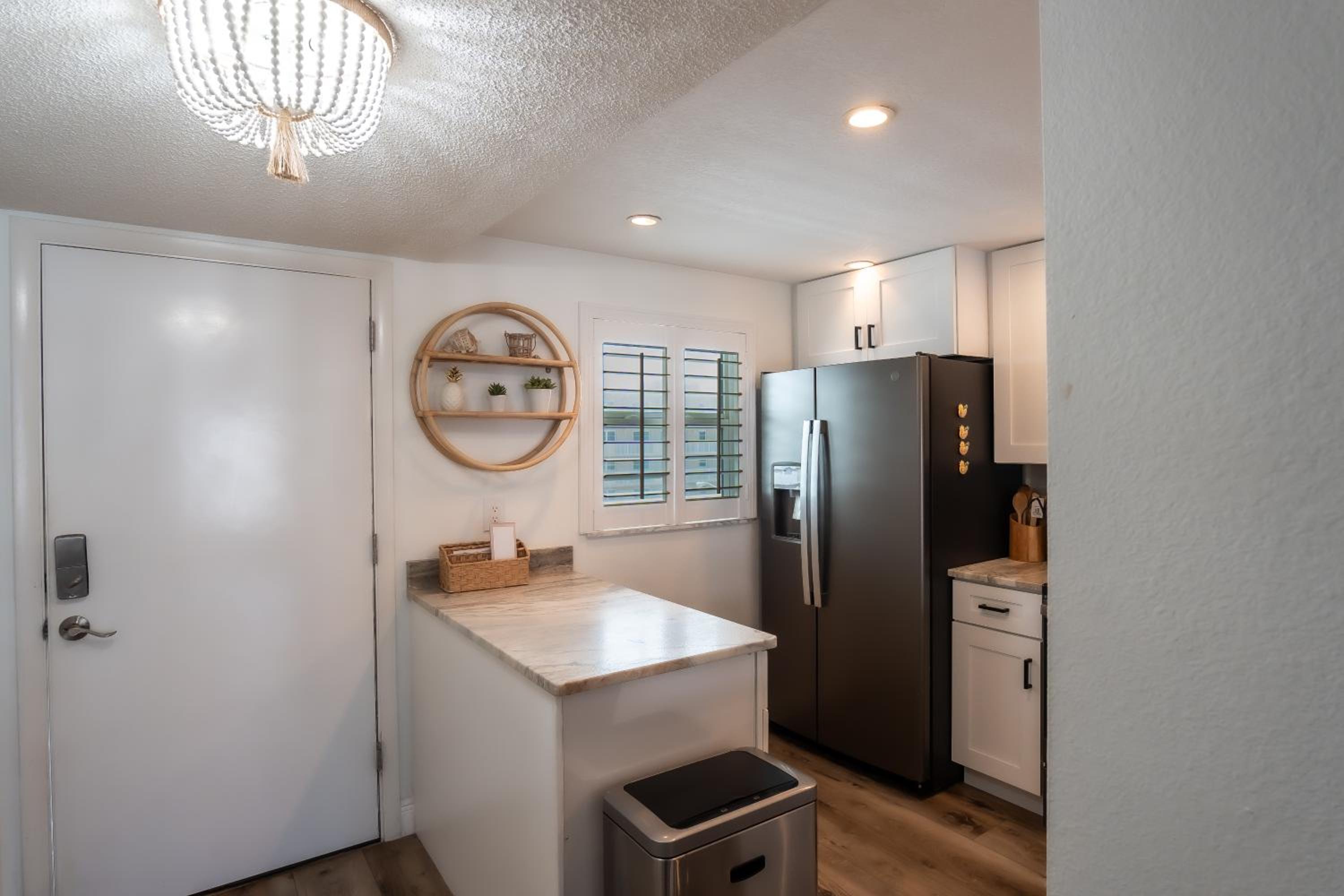Stunning coastal condo with ocean and pool views from the balcony!