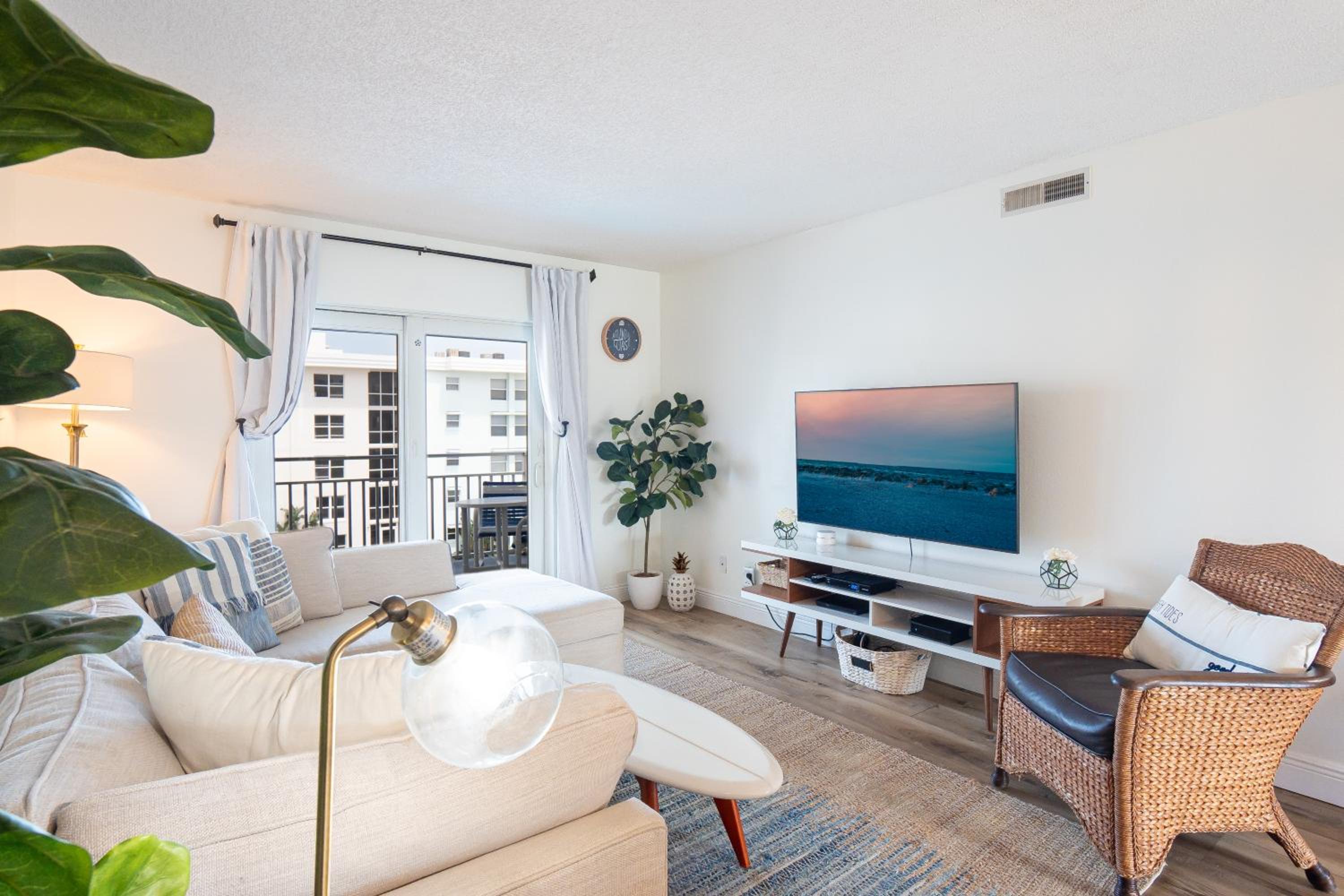 Stunning coastal condo with ocean and pool views from the balcony!