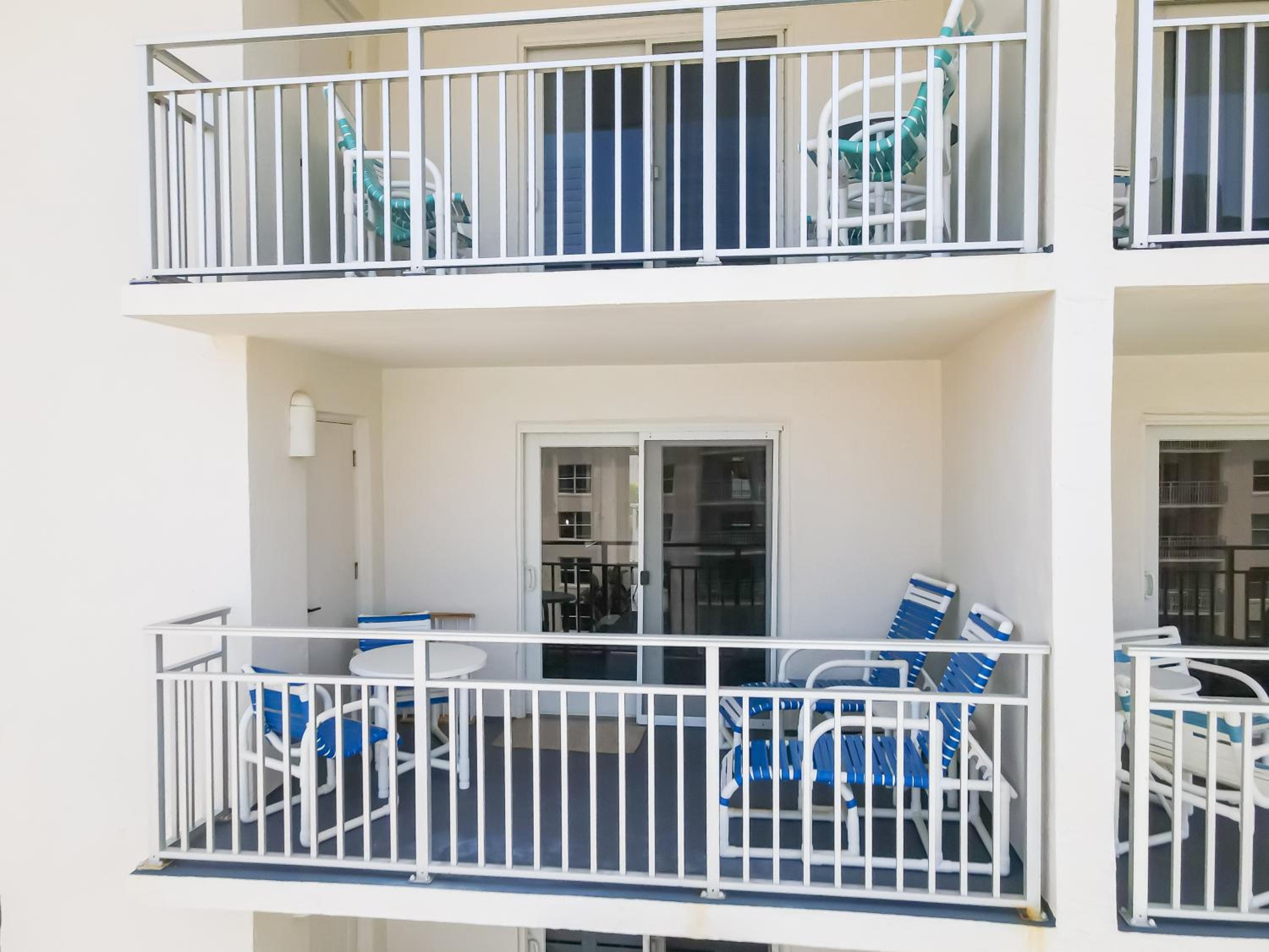 Stunning coastal condo with ocean and pool views from the balcony!