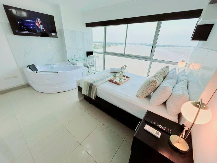 Ecusuites Ejecutiva Mini view río guayas Aeropuerto