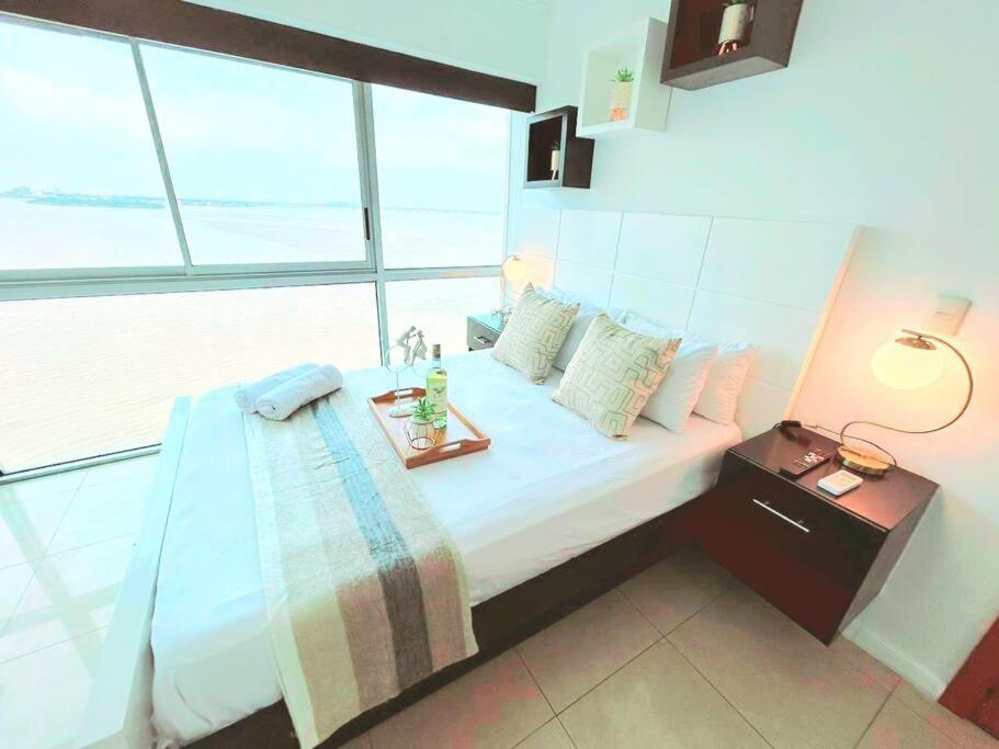 Ecusuites Ejecutiva Mini view río guayas Aeropuerto
