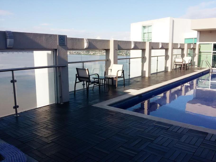 Ecusuites Ejecutiva Mini view río guayas Aeropuerto