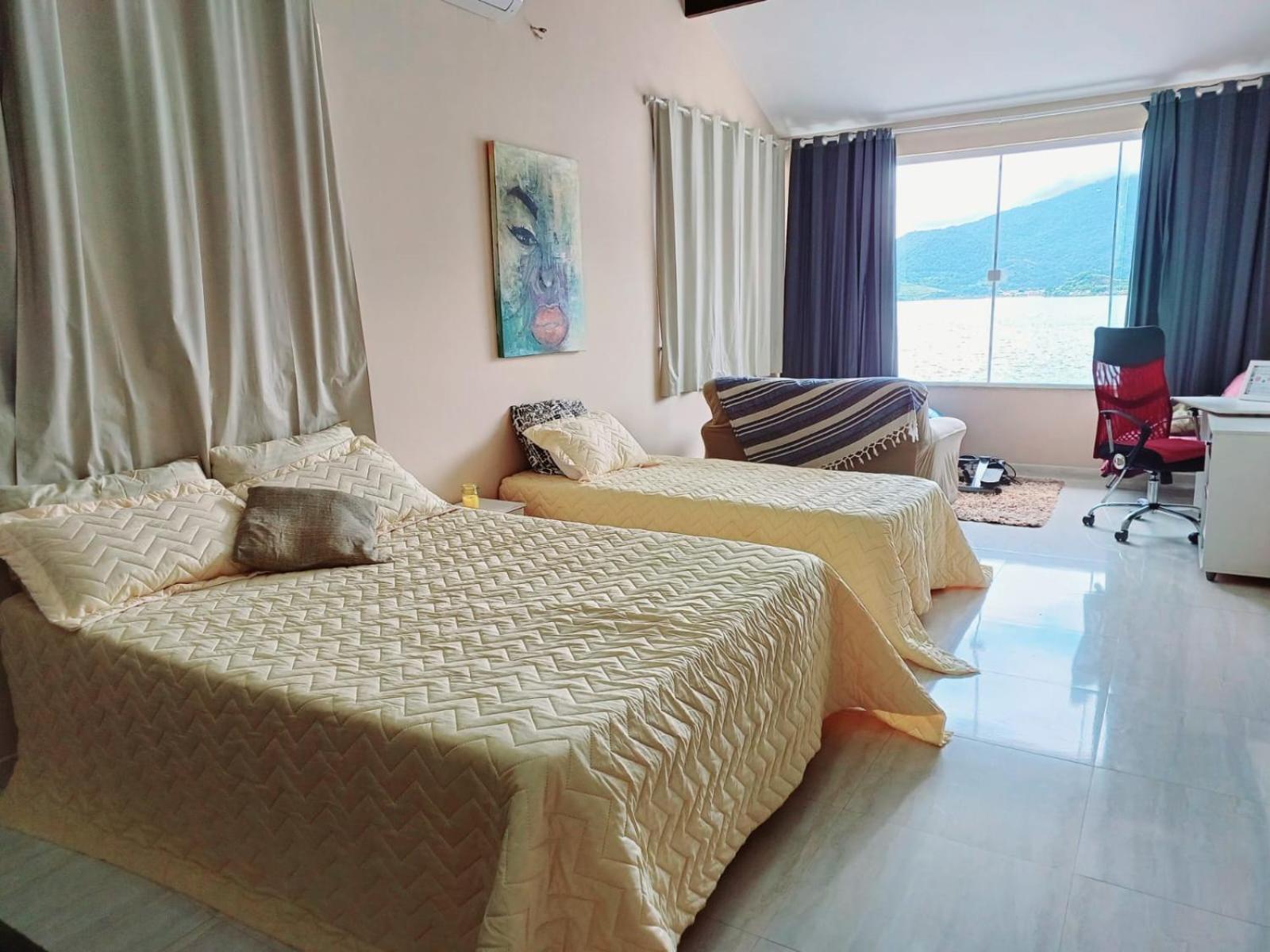 Casa na Ilha Jardim pé na areia