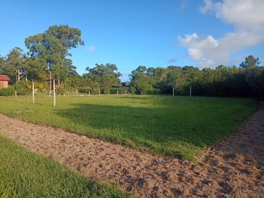 Casa na lagoa do Palmital com acesso à lagoa na propriedade e localizada apenas a 13 km da praia de Atlântida Sul e do Centro de Osório Lugar com Natureza-