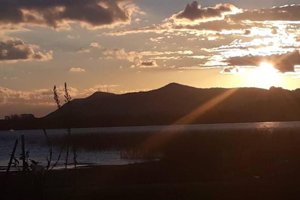 Casa na lagoa do Palmital com acesso à lagoa na propriedade e localizada apenas a 13 km da praia de Atlântida Sul e do Centro de Osório Lugar com Natureza-