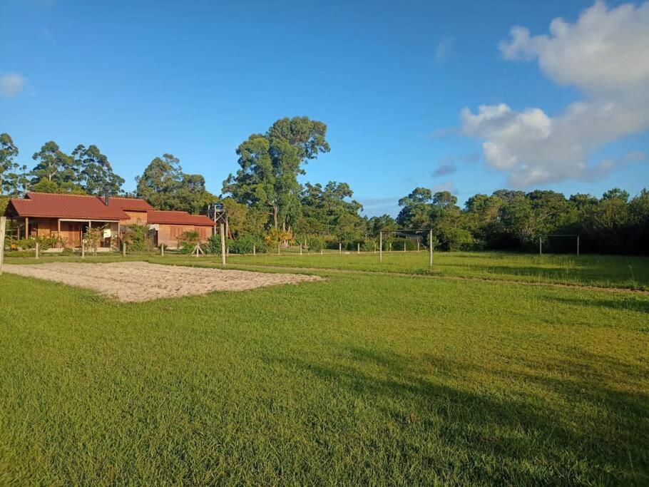 Casa na lagoa do Palmital com acesso à lagoa na propriedade e localizada apenas a 13 km da praia de Atlântida Sul e do Centro de Osório Lugar com Natureza-