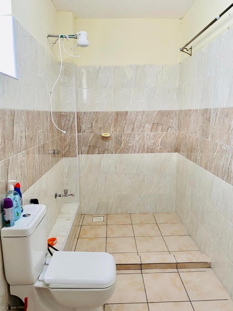 Mine is a BnB house, with 3 bedrooms. One master bedroom. It's I Pavilion Suites apartment, Block 1House N. view 2