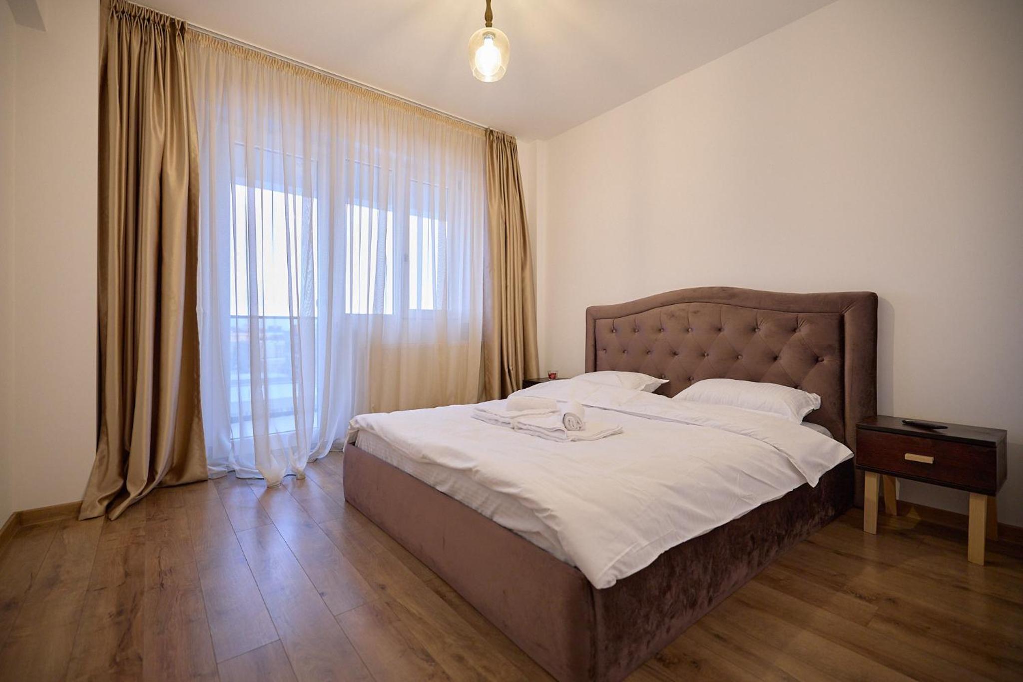 CozyCollection Apartments at Q Residence #2 view 4