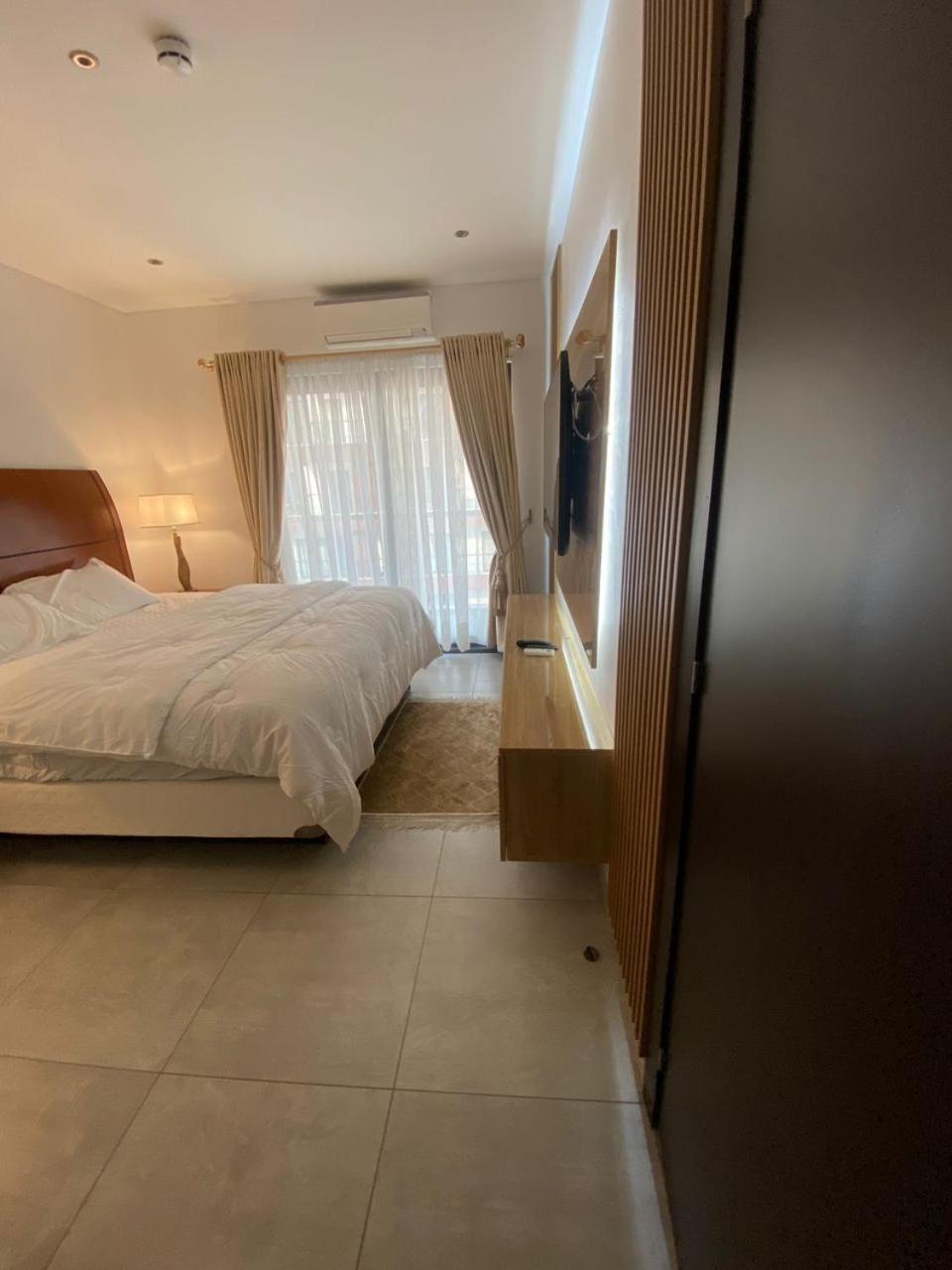 THE SIGNATURE HOTEL APARTMENT
