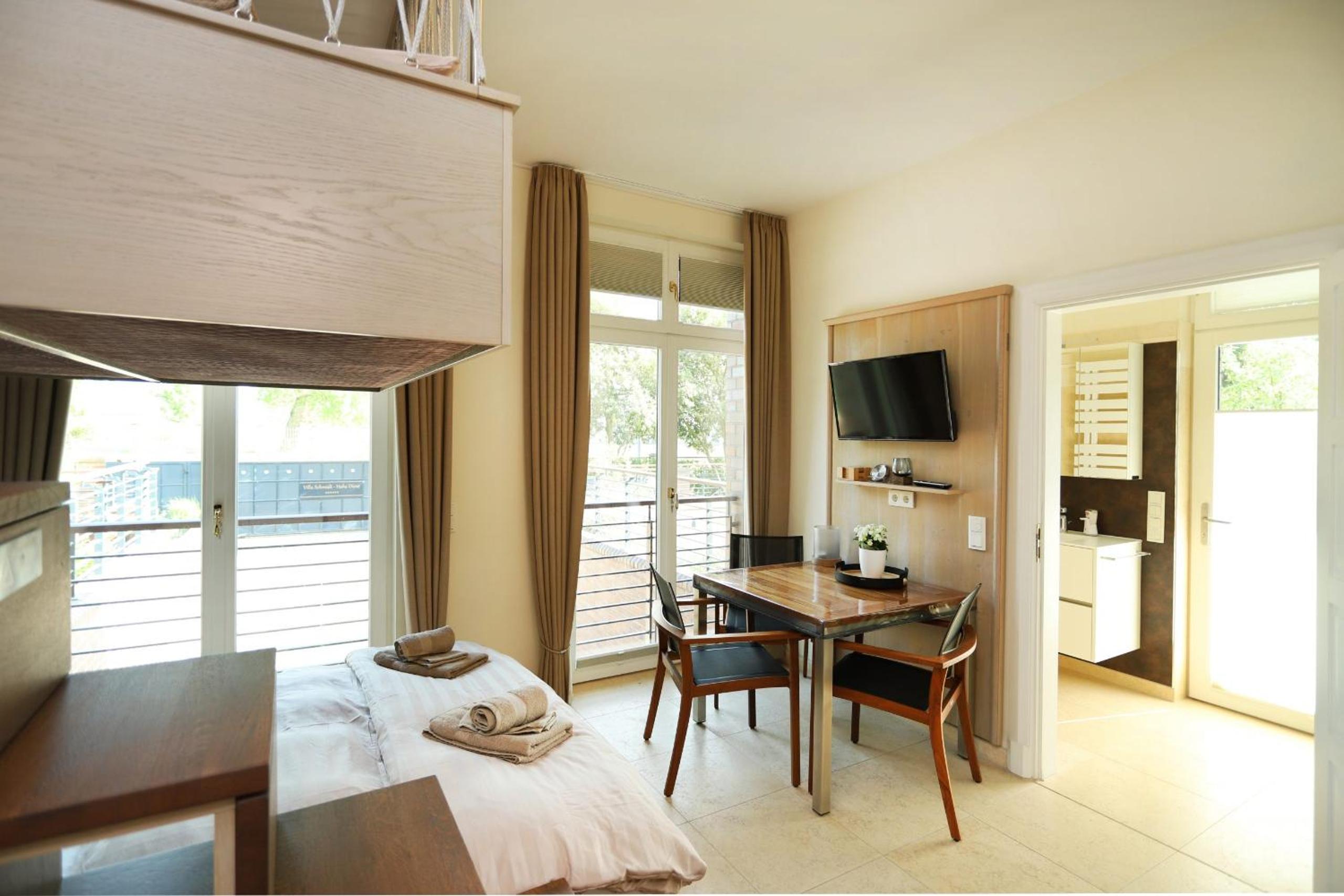 Villa Schmidt Apartments - Strandhaus direkt am Meer mit Sauna, Sport und Dünengarten - Studio