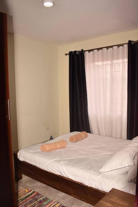 Beautiful One bedroom apt with pool & rooftop near Acacia mall and Ntinda view 3