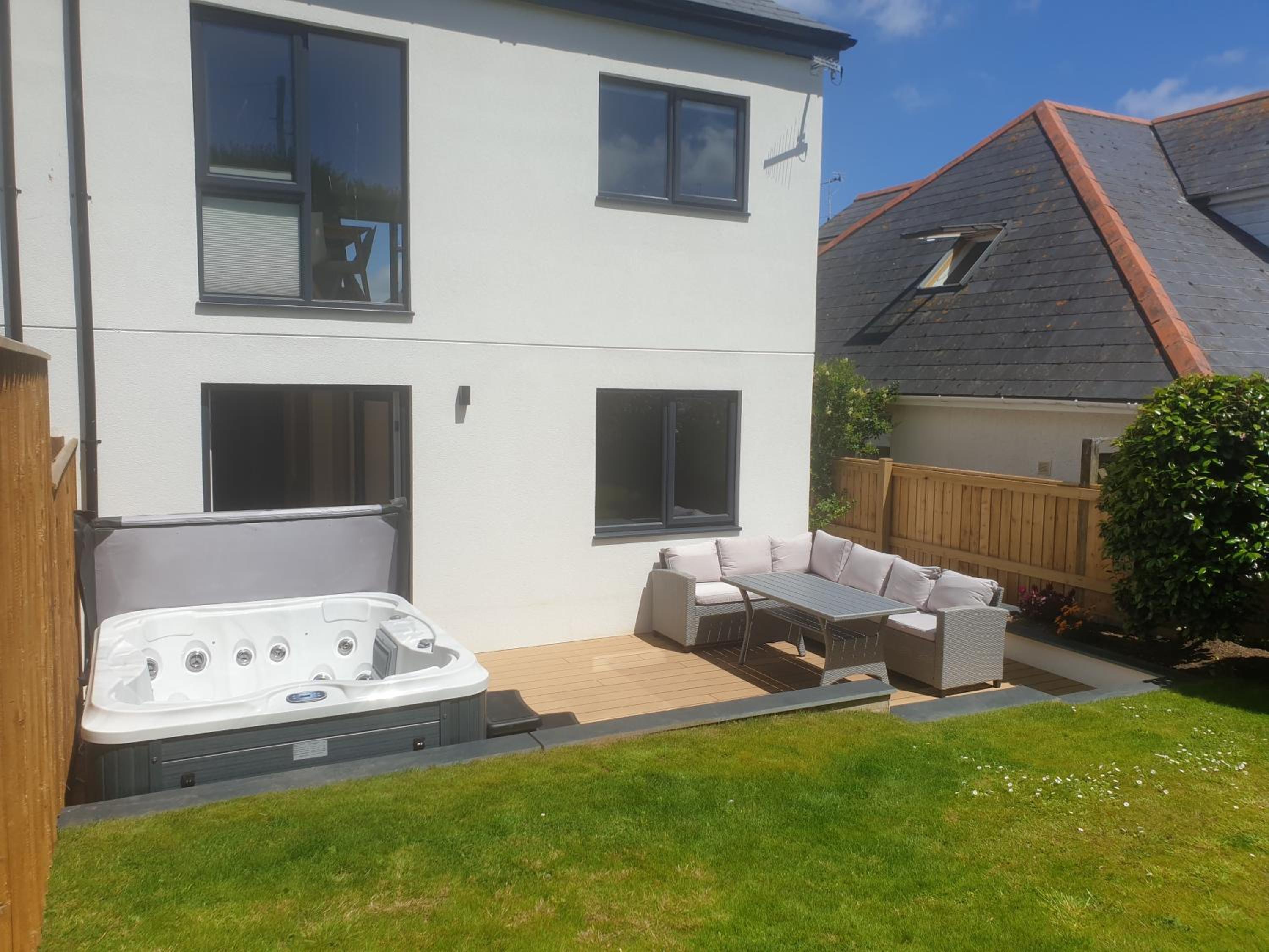 Modern open plan house, sea views and hot tub view 2