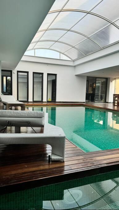 Luxury villa with a heated indoor pool and direct access to the beach view 5