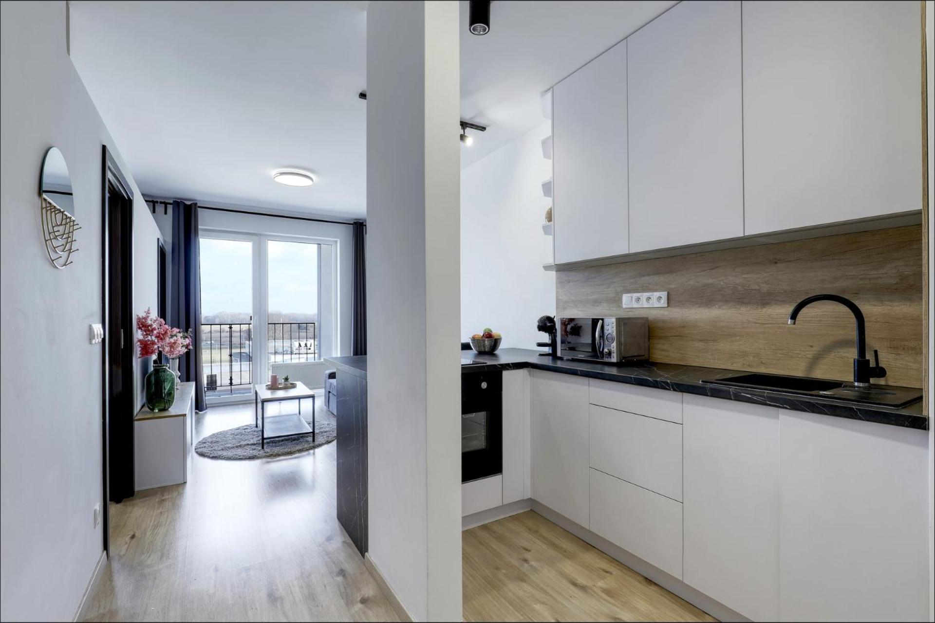 STAR cozy apartment in a modern neighborhood view 4