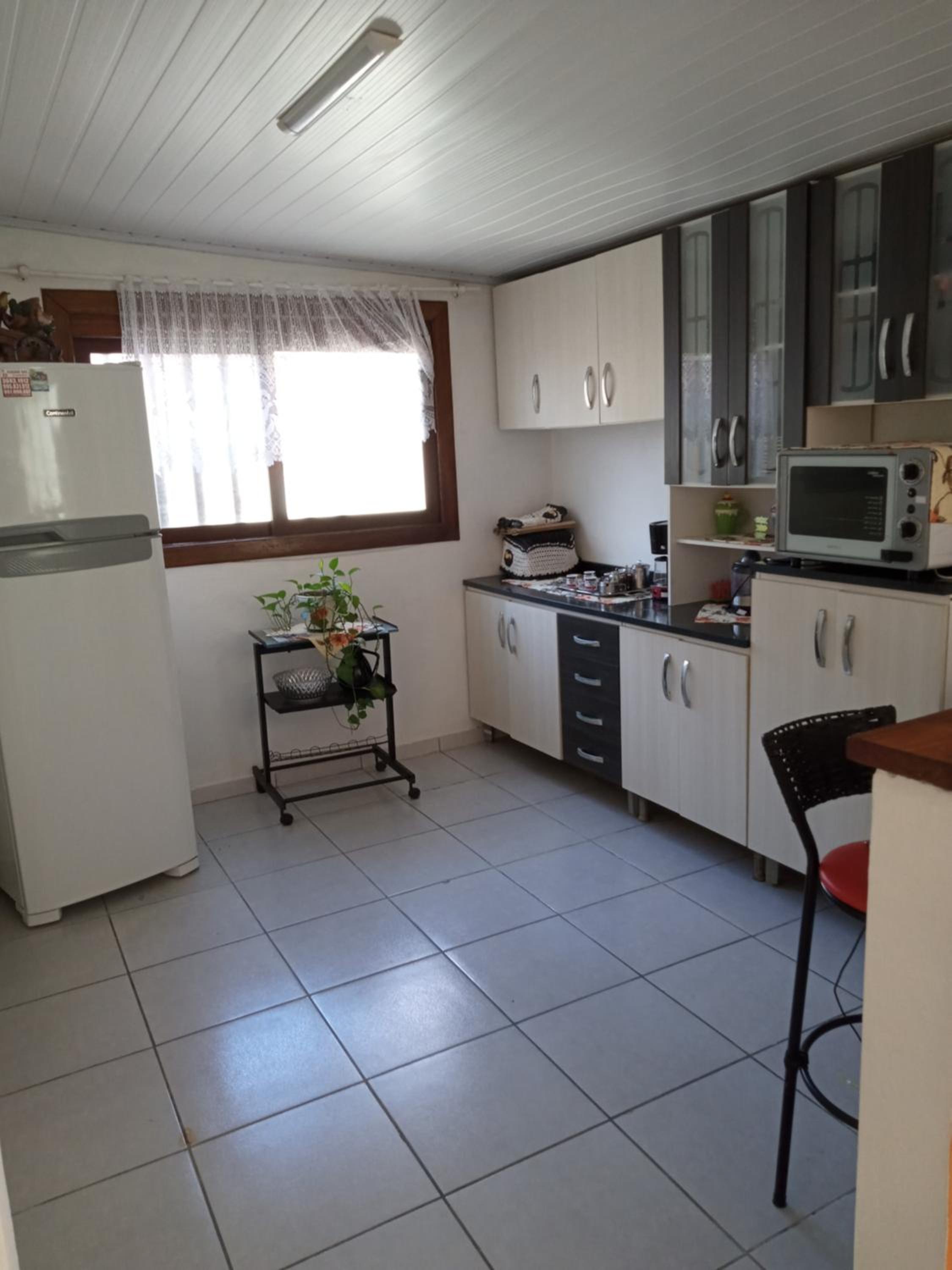 Casa com piscina no imbé