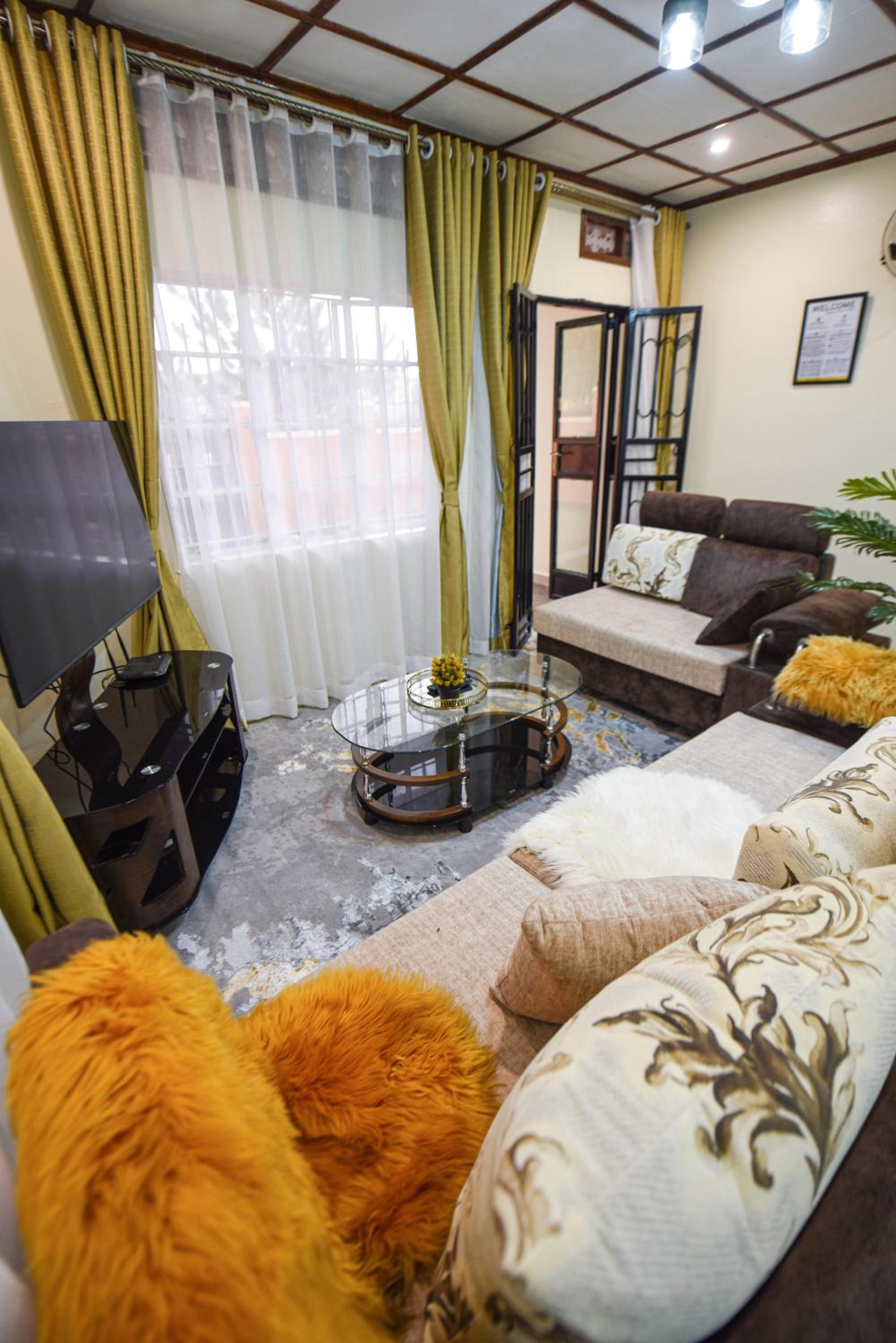 Entire 3-Bedroom Holiday Home in Kampala, Lovingly Furnished view 2