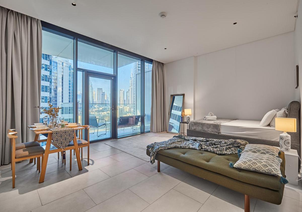 Luxury Studios with Burj Khalifa & Canal View in Downtown - Marquise Square Tower