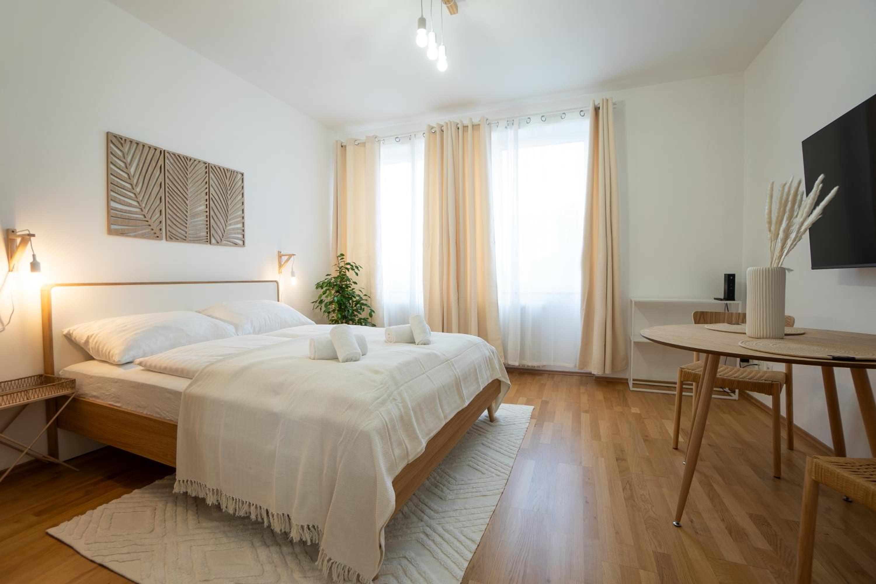 Bright and cozy studio with a city view