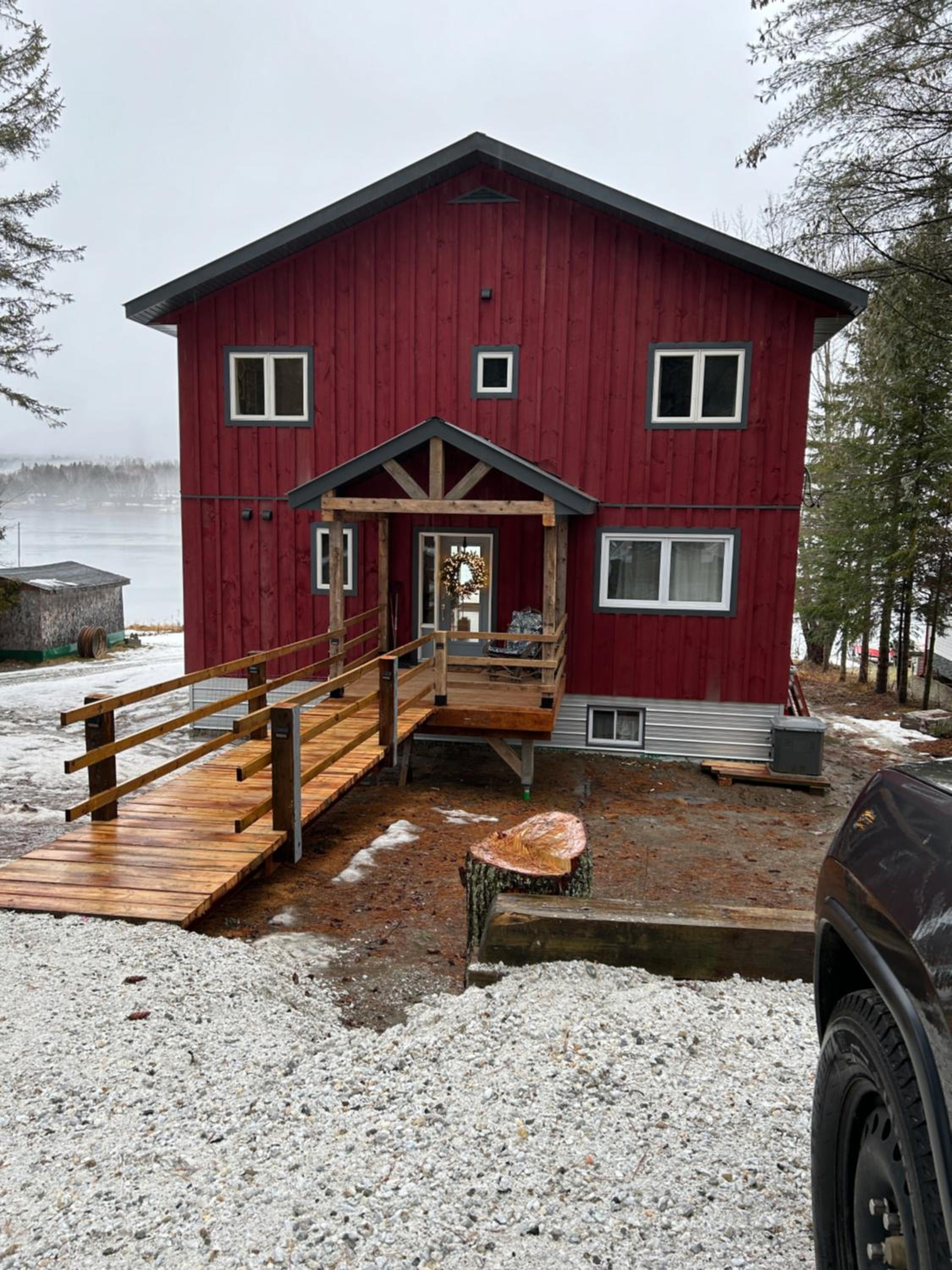 New build, luxurious, 4 plus bedrooms, 2 and a half baths, waterfront chalet, SNOWMOBILE trail access, ample parking & ICE FISHING SHACK