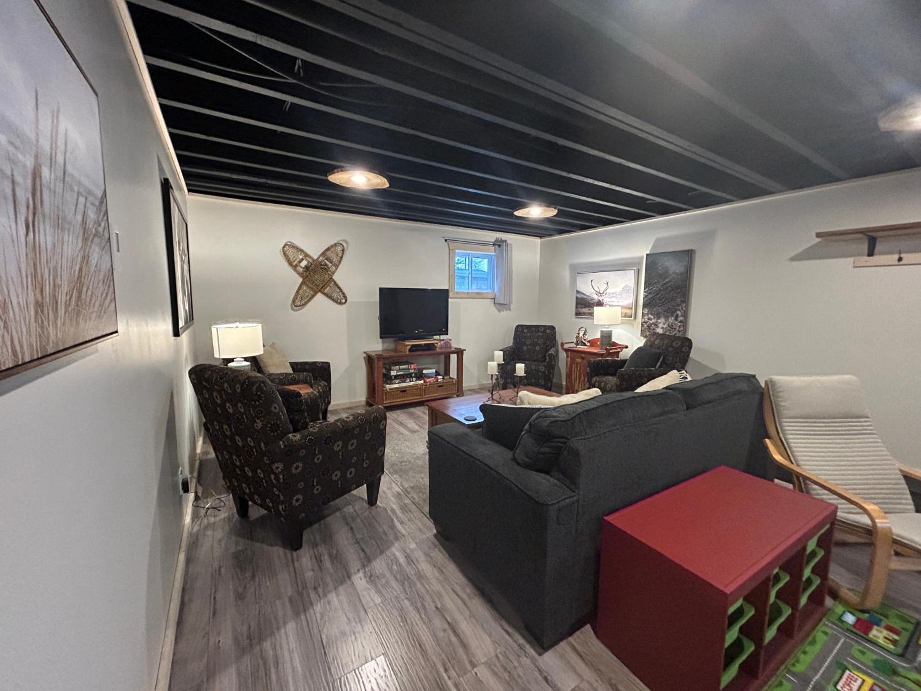 New build, luxurious, 4 plus bedrooms, 2 and a half baths, waterfront chalet, SNOWMOBILE trail access, ample parking & ICE FISHING SHACK