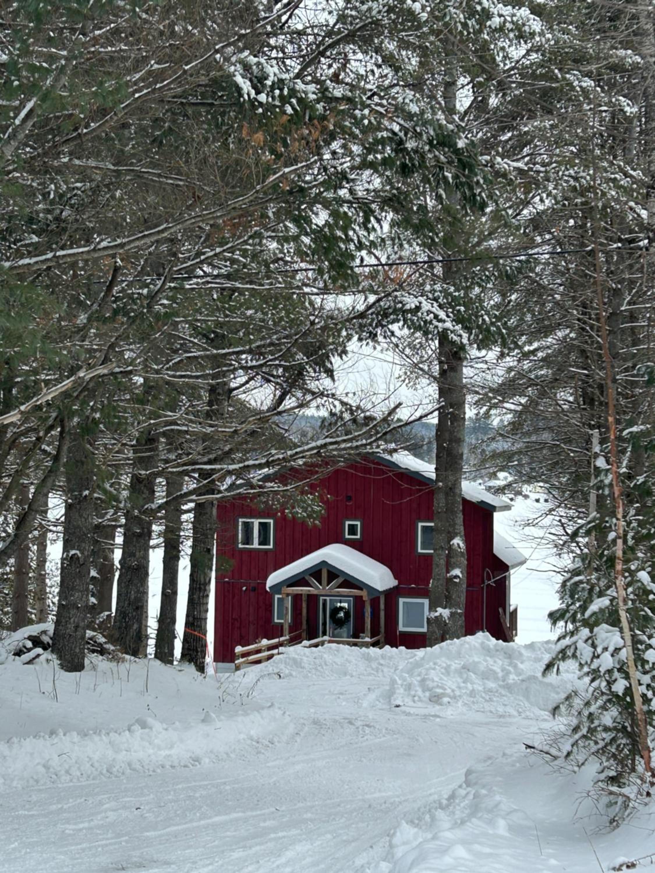 New build, luxurious, 4 plus bedrooms, 2 and a half baths, waterfront chalet, SNOWMOBILE trail access, ample parking & ICE FISHING SHACK