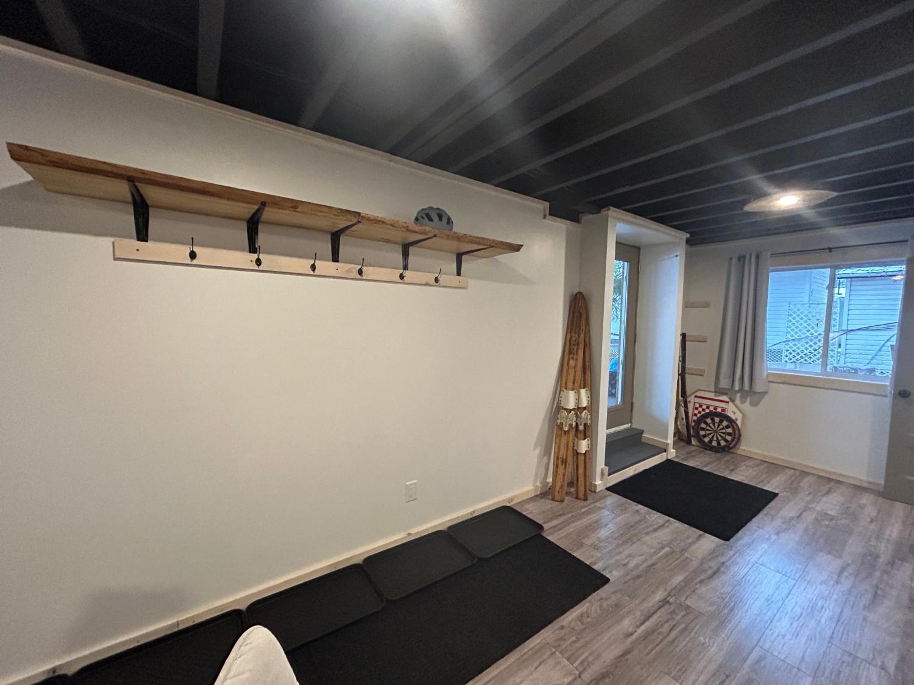 New build, luxurious, 4 plus bedrooms, 2 and a half baths, waterfront chalet, SNOWMOBILE trail access, ample parking & ICE FISHING SHACK