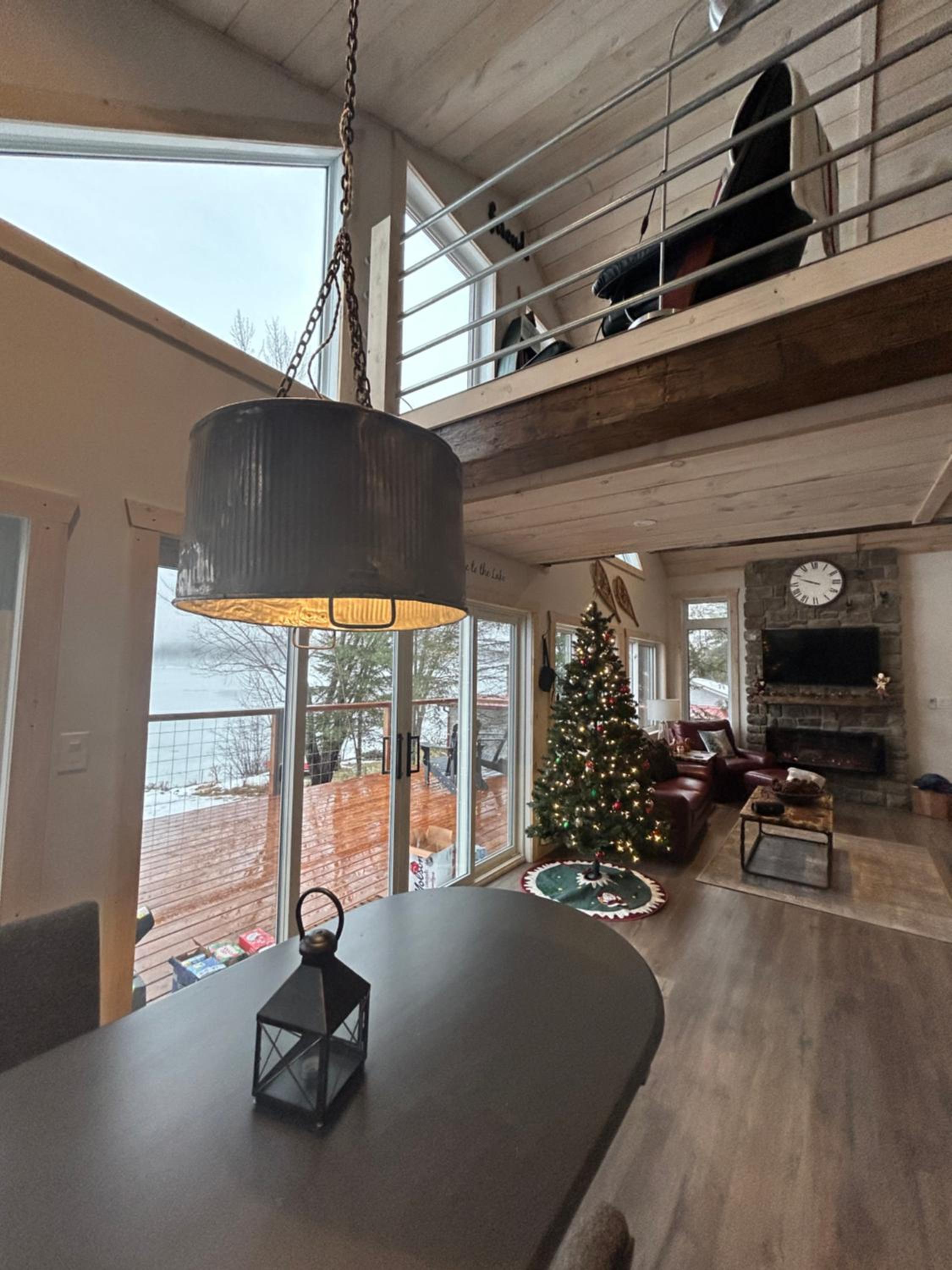 New build, luxurious, 4 plus bedrooms, 2 and a half baths, waterfront chalet, SNOWMOBILE trail access, ample parking & ICE FISHING SHACK