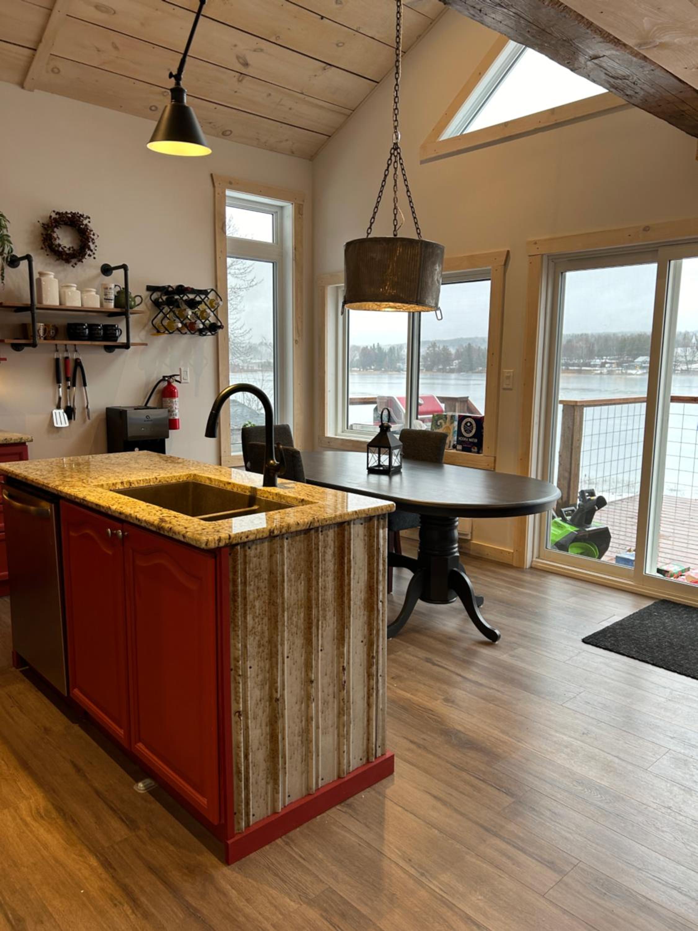 New build, luxurious, 4 plus bedrooms, 2 and a half baths, waterfront chalet, SNOWMOBILE trail access, ample parking & ICE FISHING SHACK