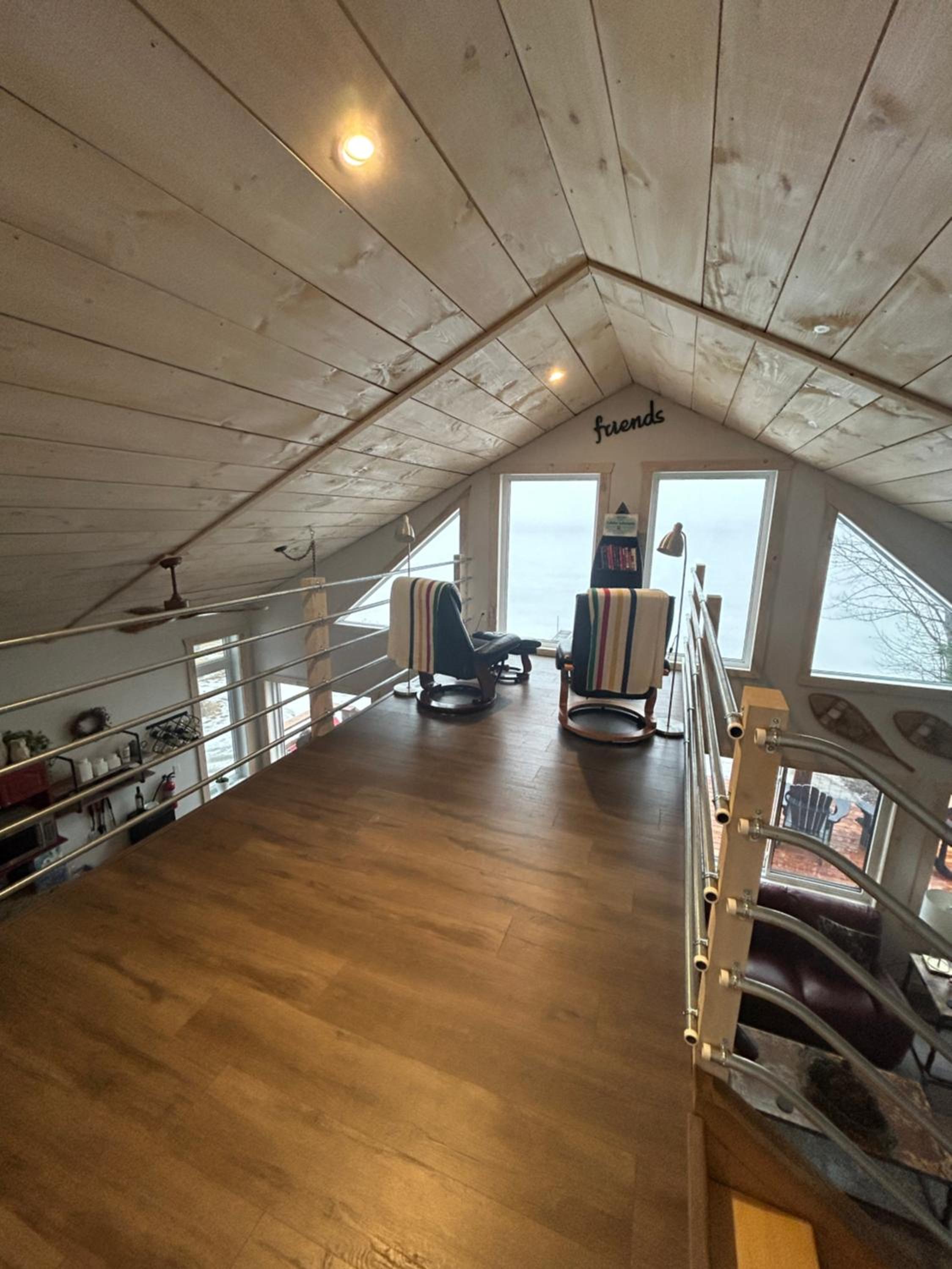 New build, luxurious, 4 plus bedrooms, 2 and a half baths, waterfront chalet, SNOWMOBILE trail access, ample parking & ICE FISHING SHACK