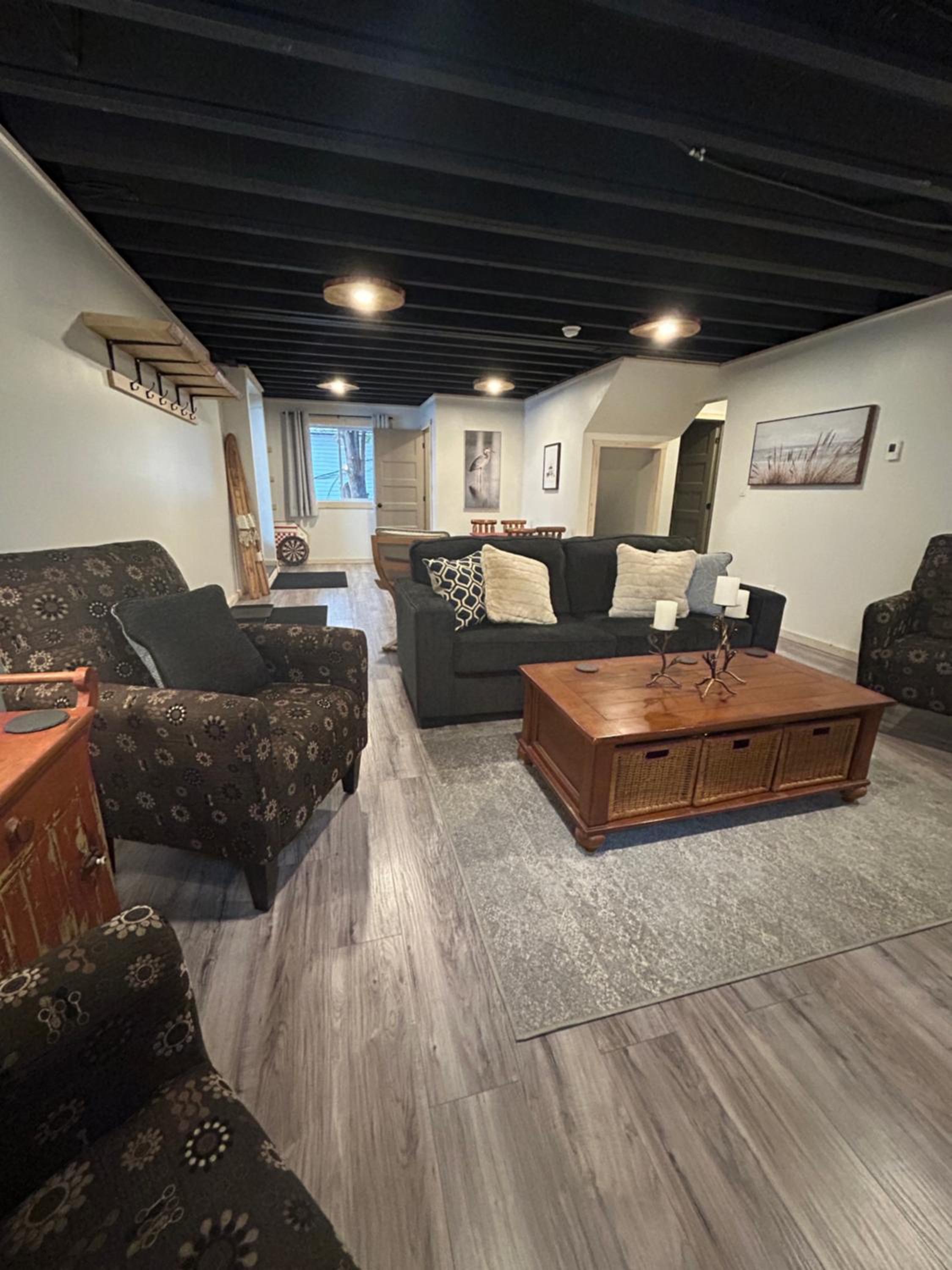 New build, luxurious, 4 plus bedrooms, 2 and a half baths, waterfront chalet, SNOWMOBILE trail access, ample parking & ICE FISHING SHACK