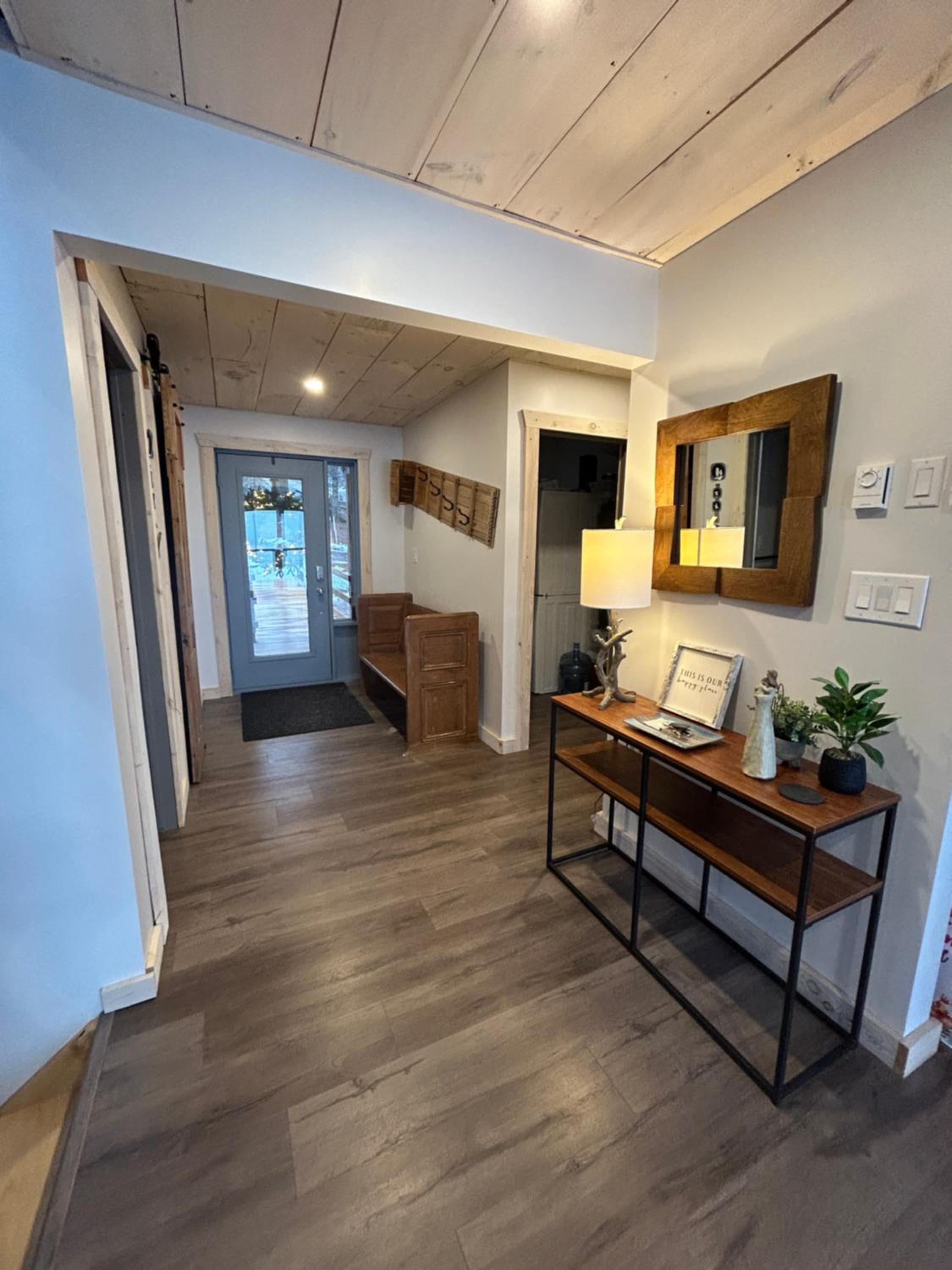 New build, luxurious, 4 plus bedrooms, 2 and a half baths, waterfront chalet, SNOWMOBILE trail access, ample parking & ICE FISHING SHACK