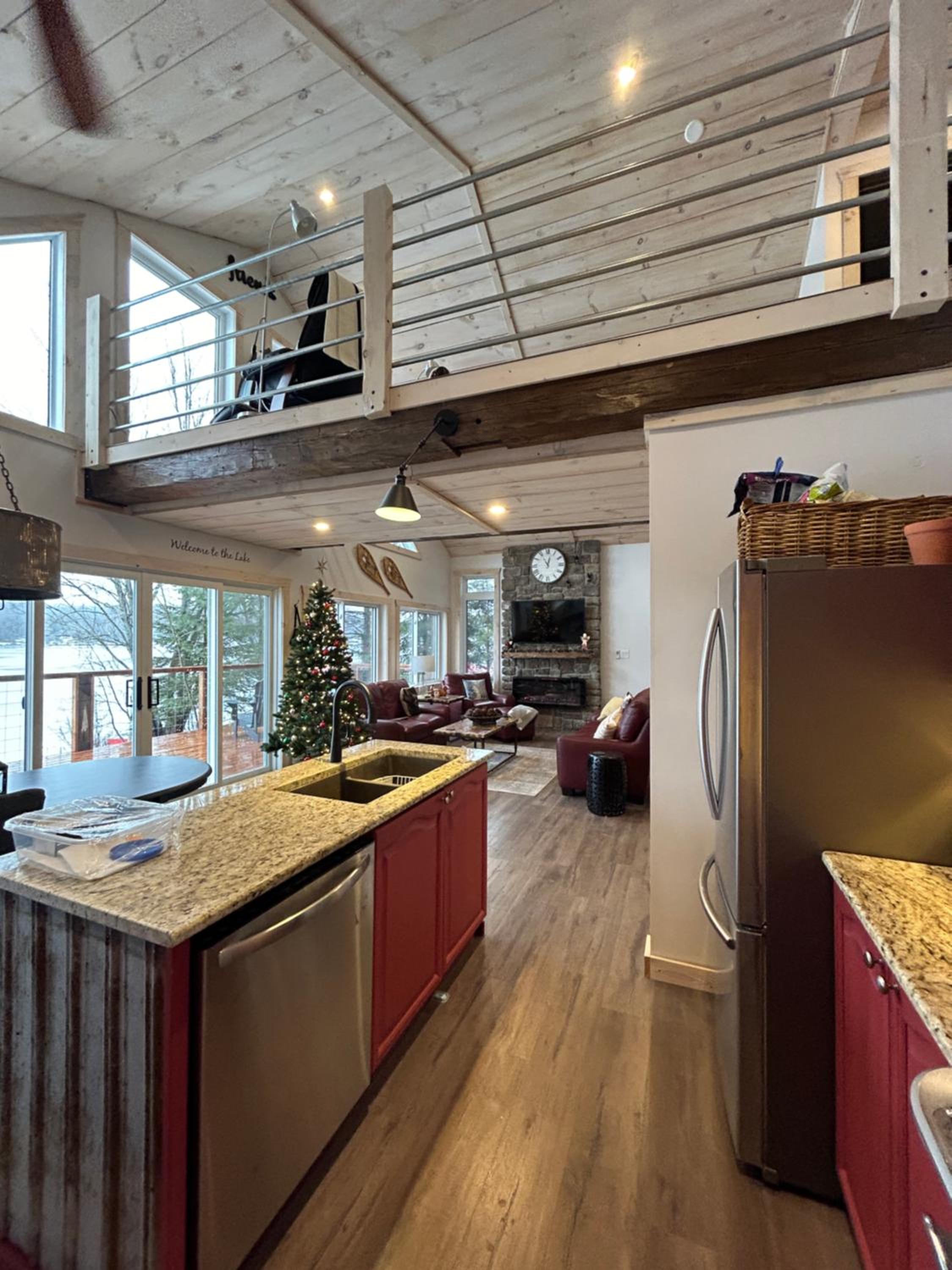 New build, luxurious, 4 plus bedrooms, 2 and a half baths, waterfront chalet, SNOWMOBILE trail access, ample parking & ICE FISHING SHACK
