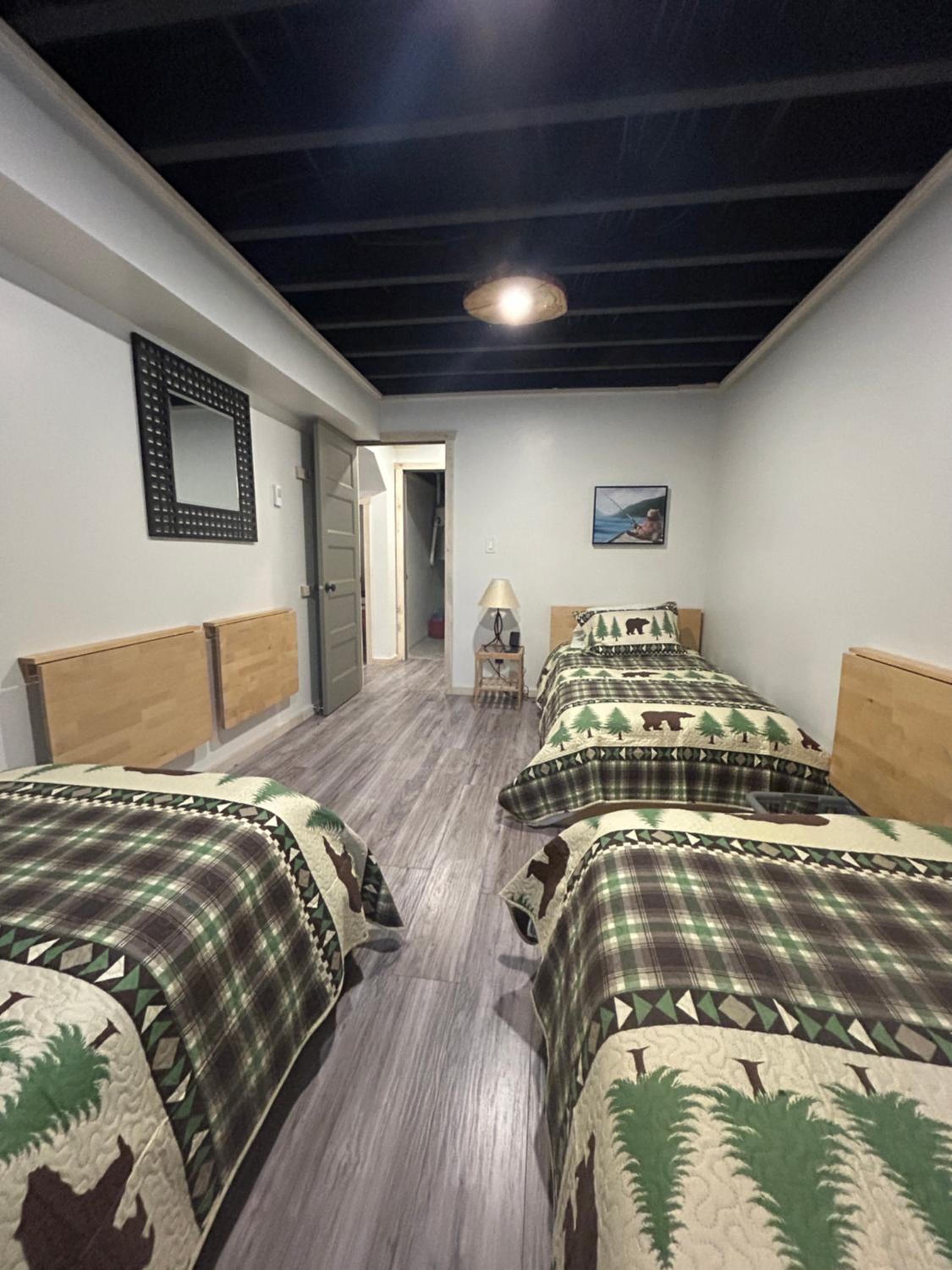 New build, luxurious, 4 plus bedrooms, 2 and a half baths, waterfront chalet, SNOWMOBILE trail access, ample parking & ICE FISHING SHACK