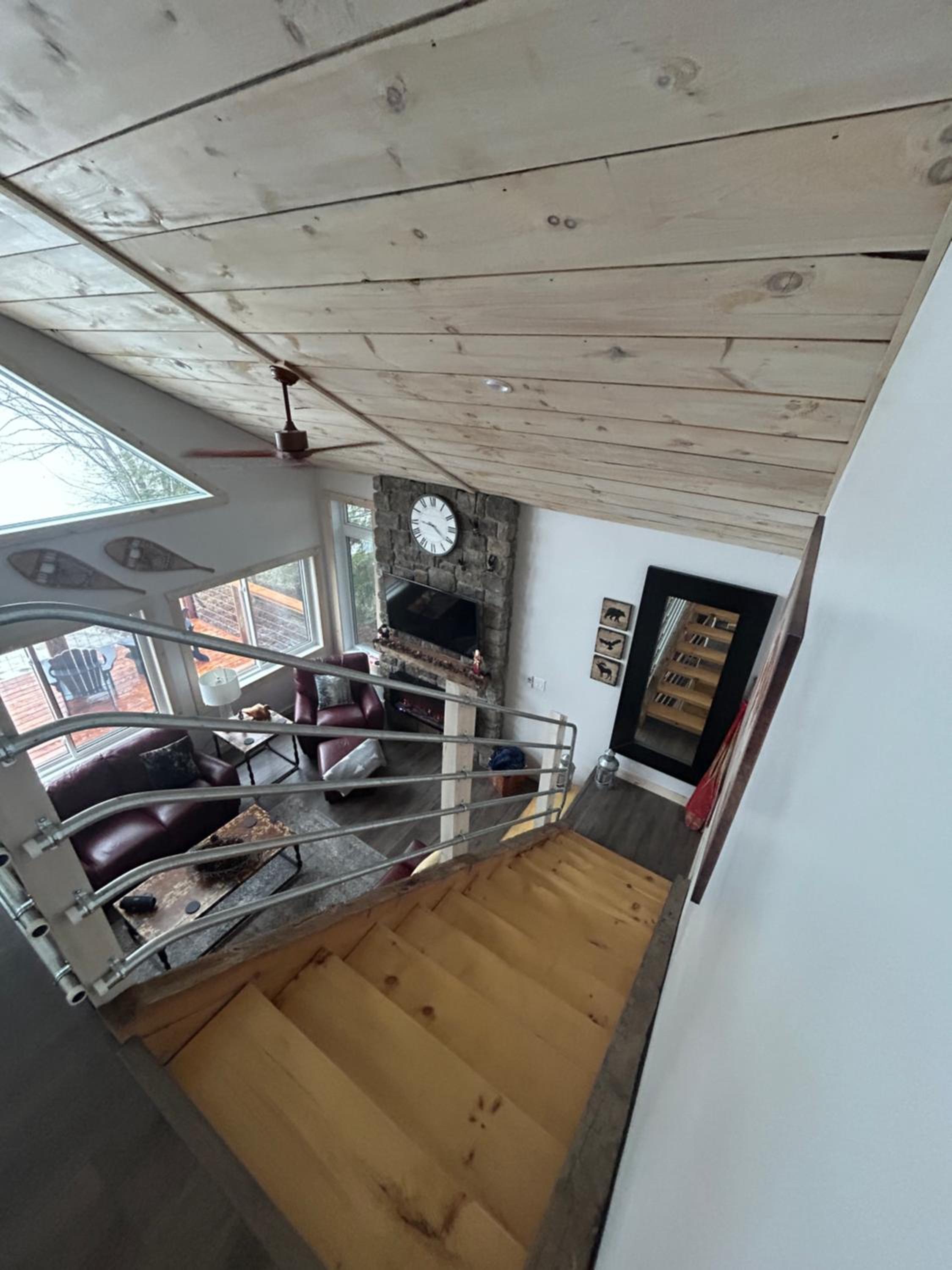 New build, luxurious, 4 plus bedrooms, 2 and a half baths, waterfront chalet, SNOWMOBILE trail access, ample parking & ICE FISHING SHACK