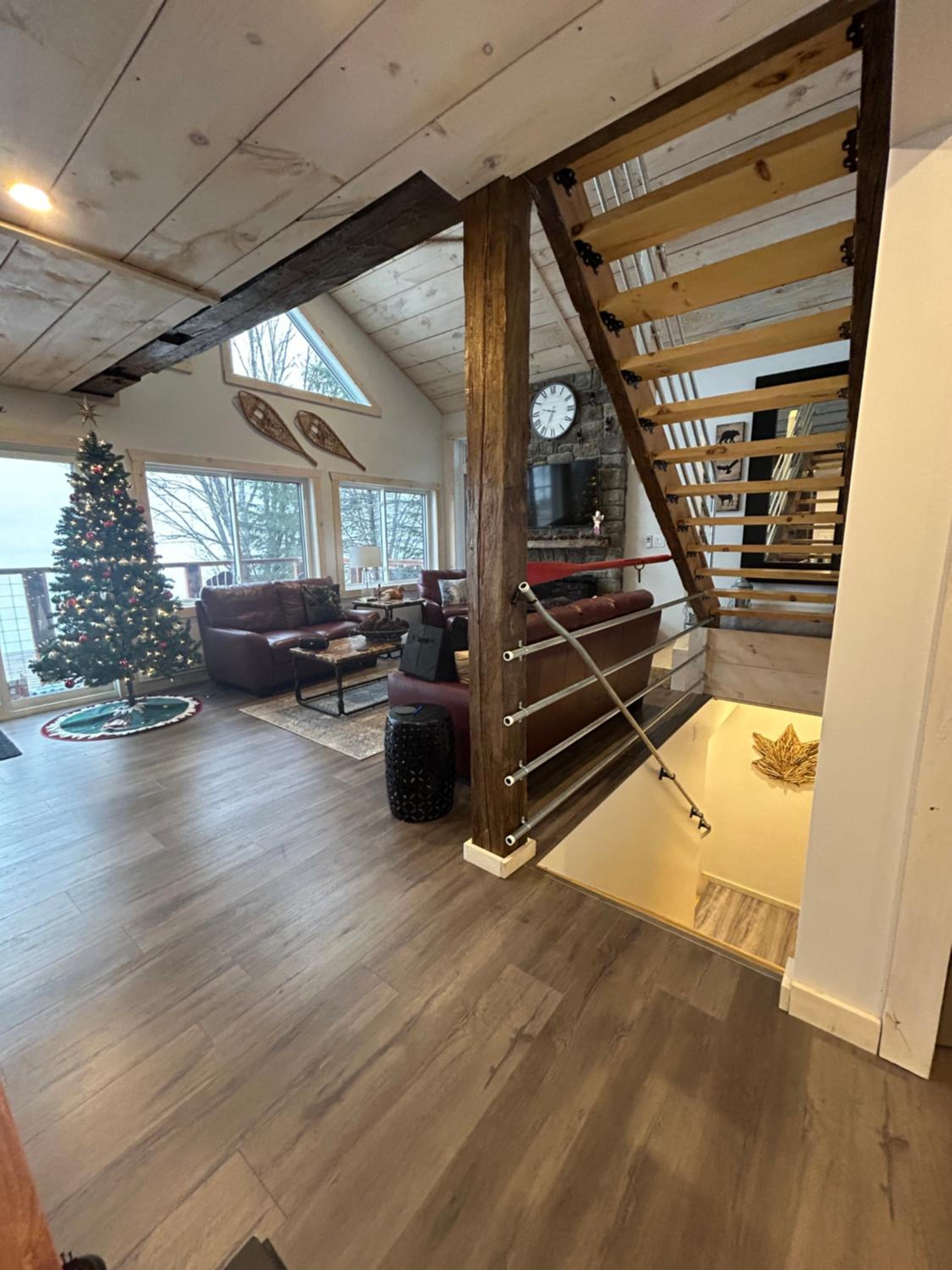 New build, luxurious, 4 plus bedrooms, 2 and a half baths, waterfront chalet, SNOWMOBILE trail access, ample parking & ICE FISHING SHACK