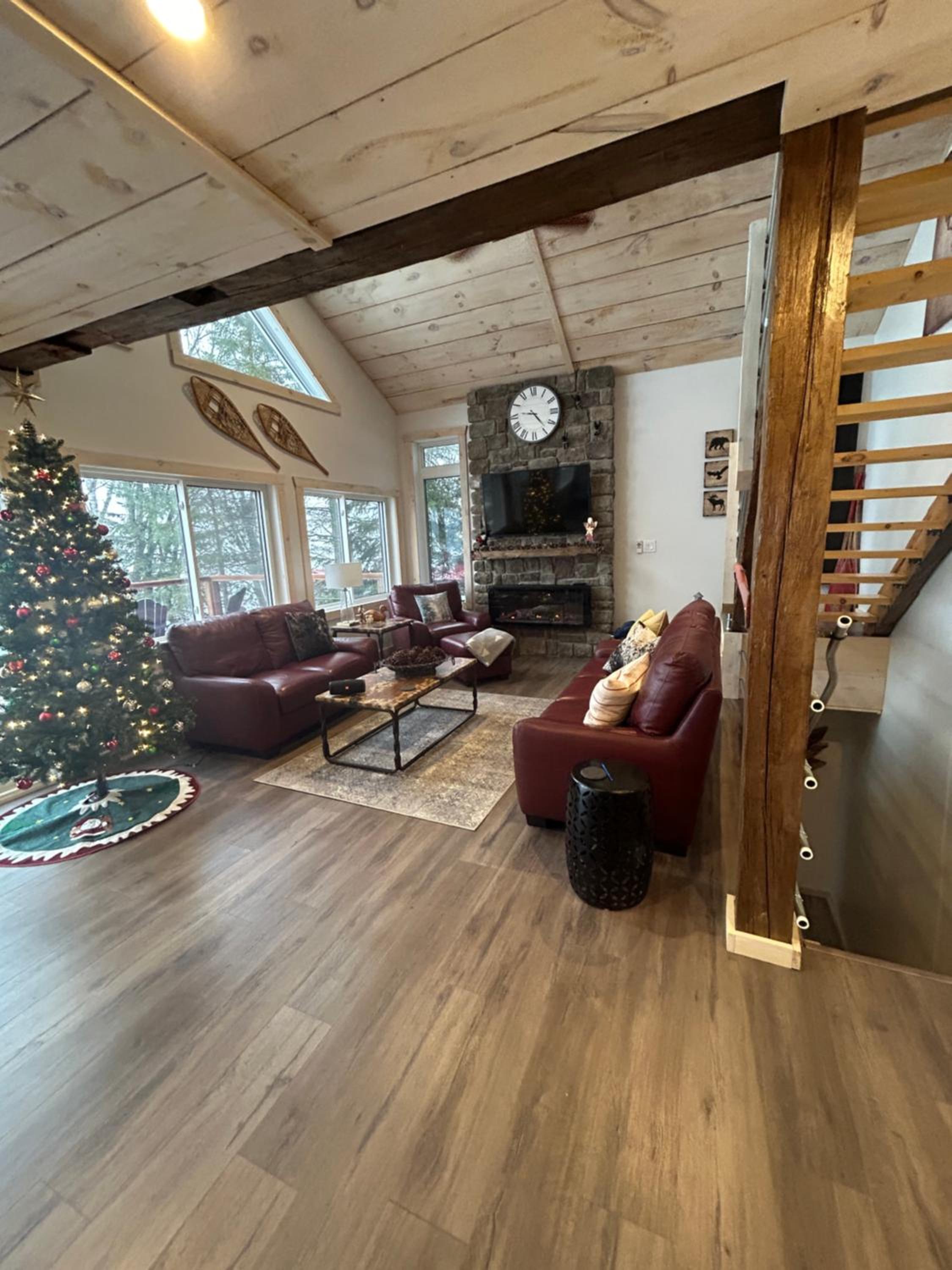 New build, luxurious, 4 plus bedrooms, 2 and a half baths, waterfront chalet, SNOWMOBILE trail access, ample parking & ICE FISHING SHACK