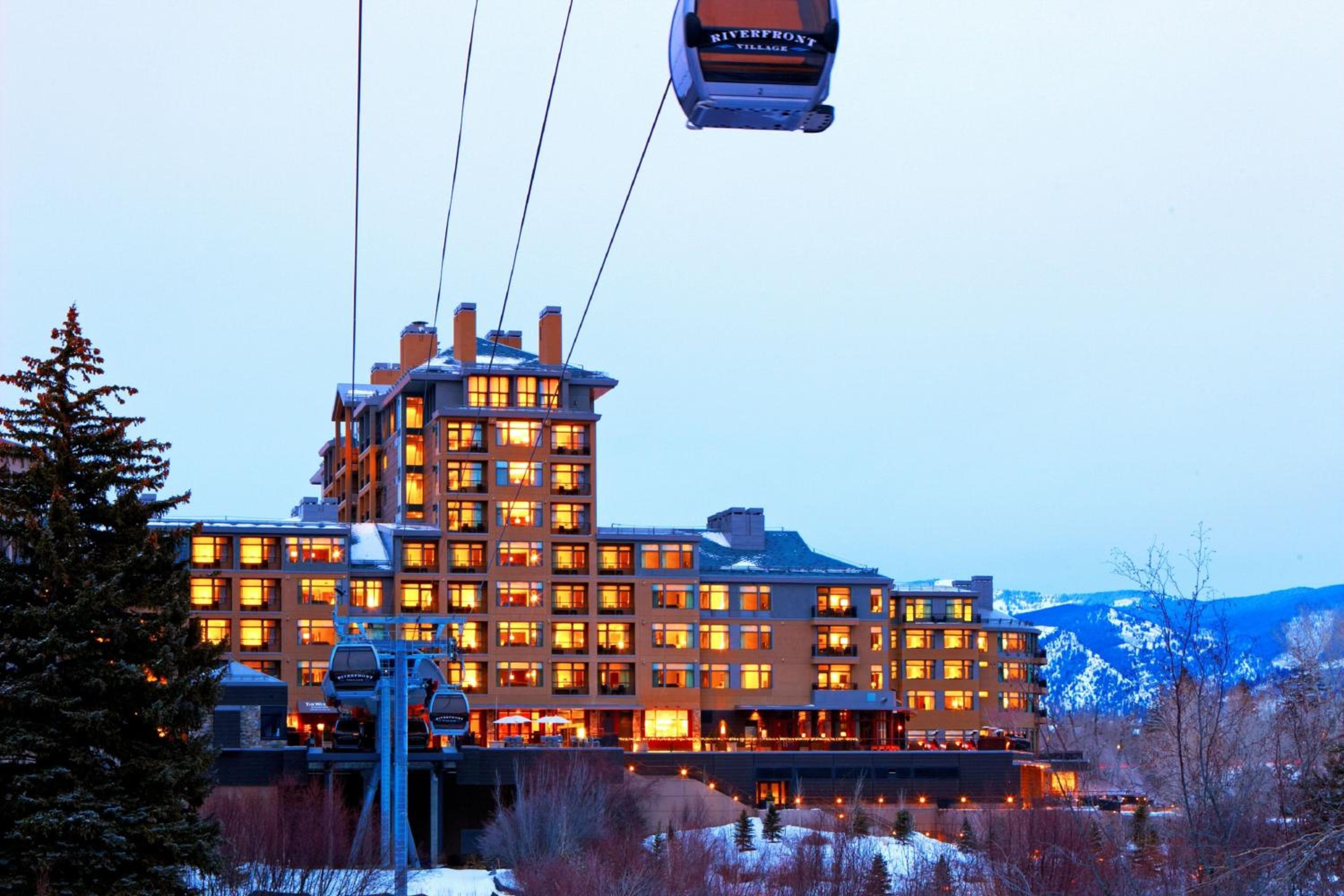 Westin Riverfront Resort and Spa back exterior view with the Riverfront Express Gondola running right to the hotel