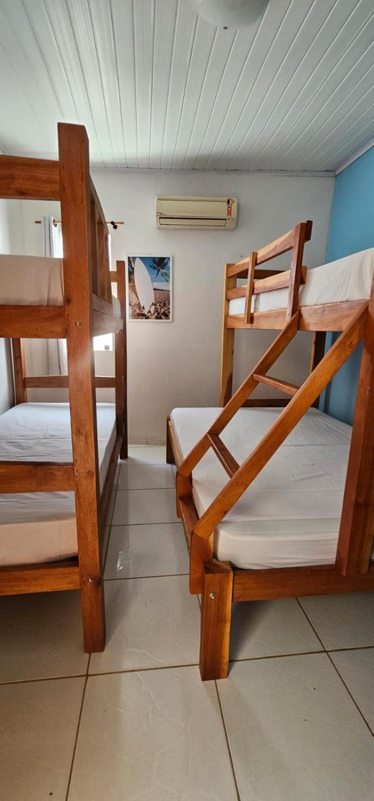 Casa Mukau pé na areia