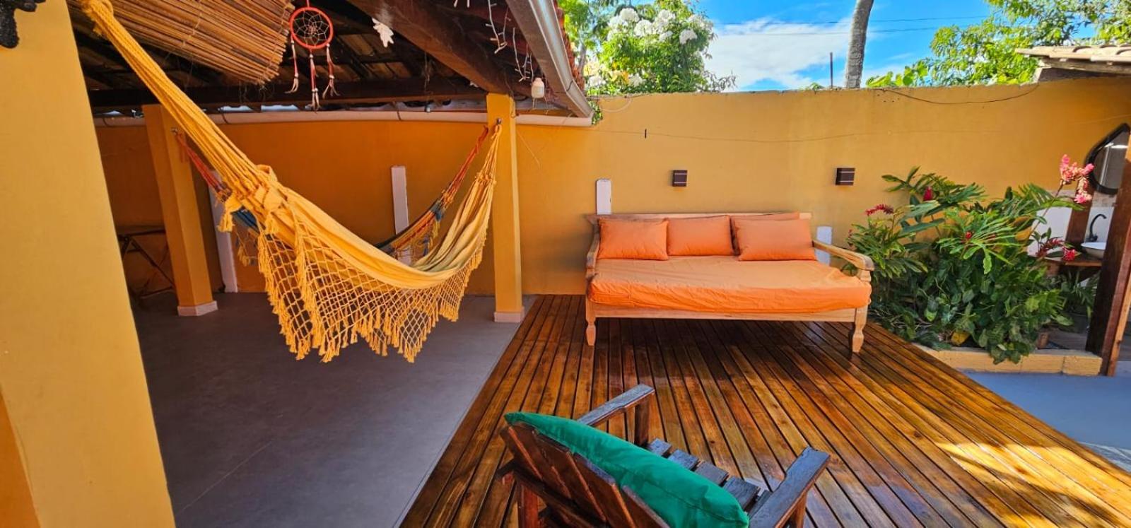 Casa Mukau pé na areia